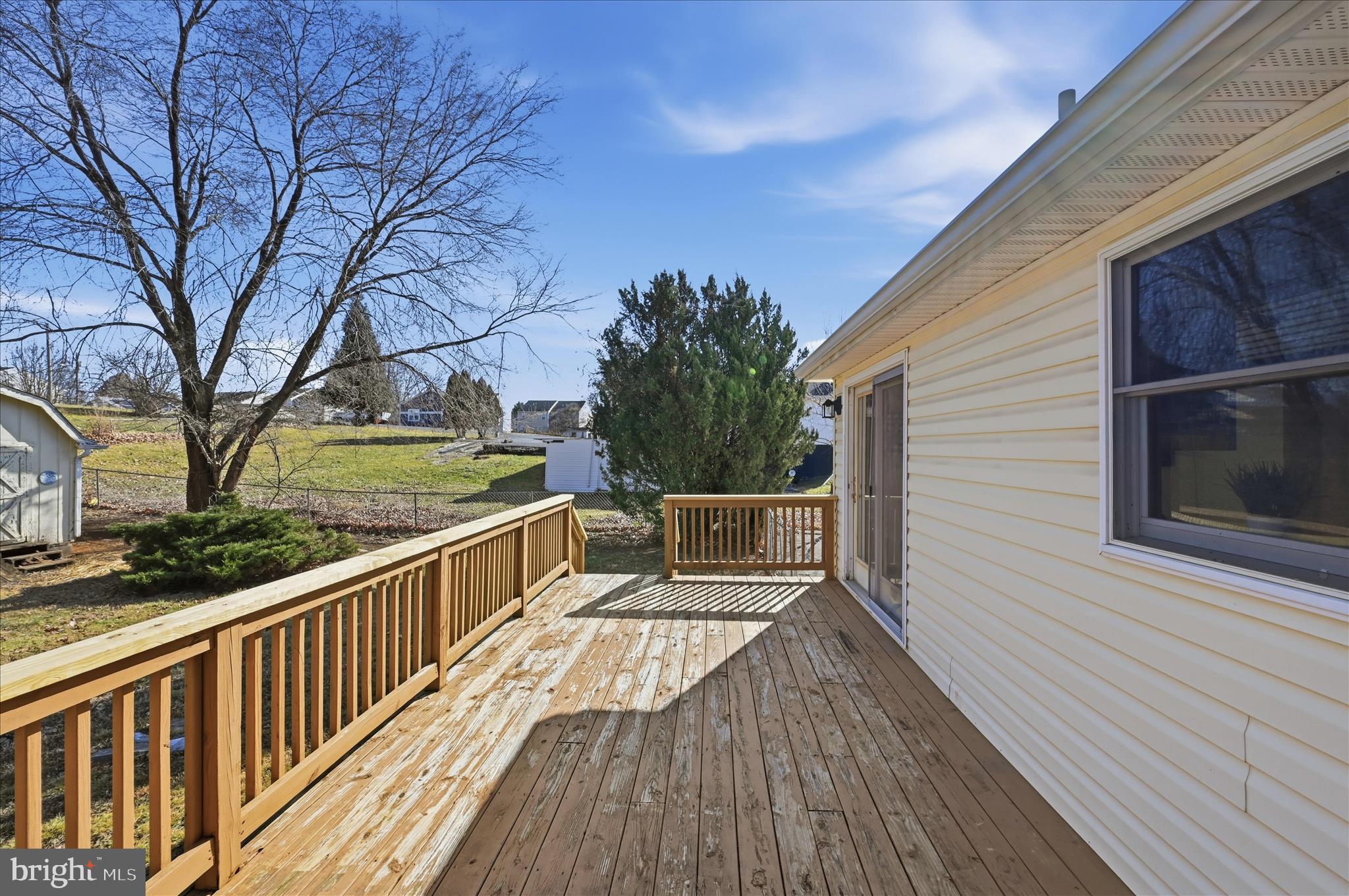 804 North Reymann Street Ranson, WV 25438 - Photo 13 of 53 a view of balcony with wooden floor and fence