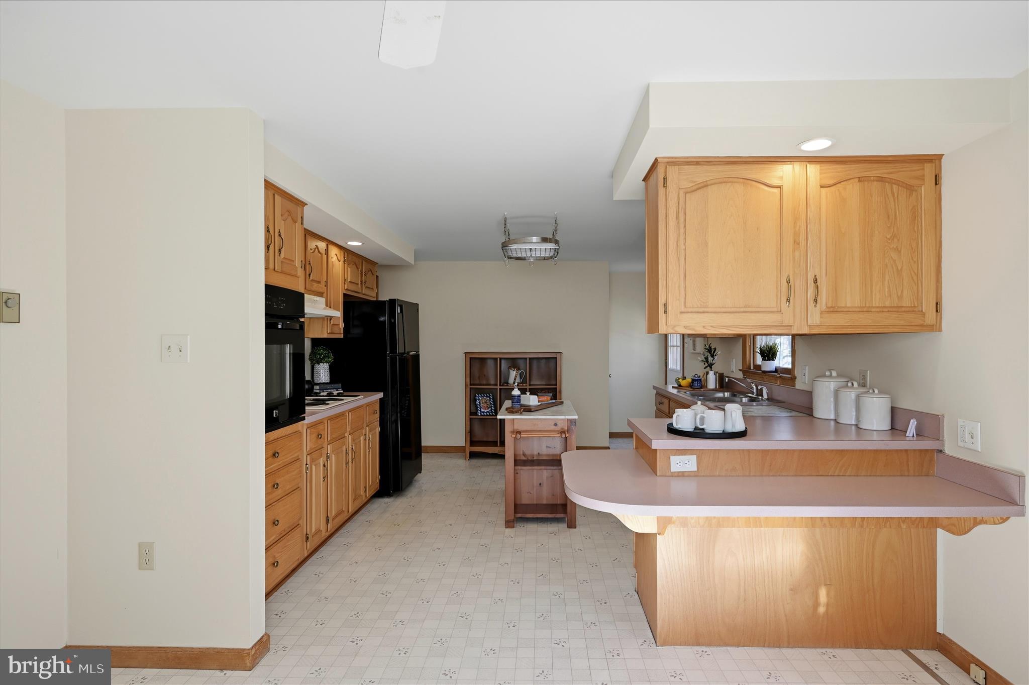 804 North Reymann Street Ranson, WV 25438 - Photo 15 of 53 a kitchen with stainless steel appliances a stove a sink and a refrigerator