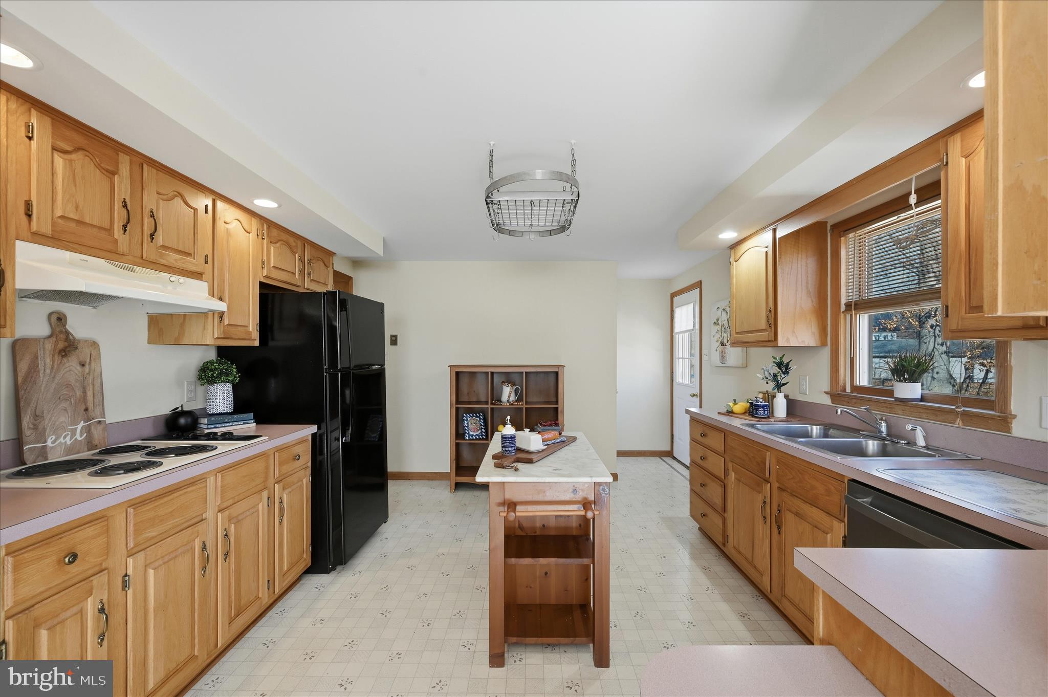 804 North Reymann Street Ranson, WV 25438 - Photo 16 of 53 a large kitchen with stainless steel appliances granite countertop a stove refrigerator and a sink