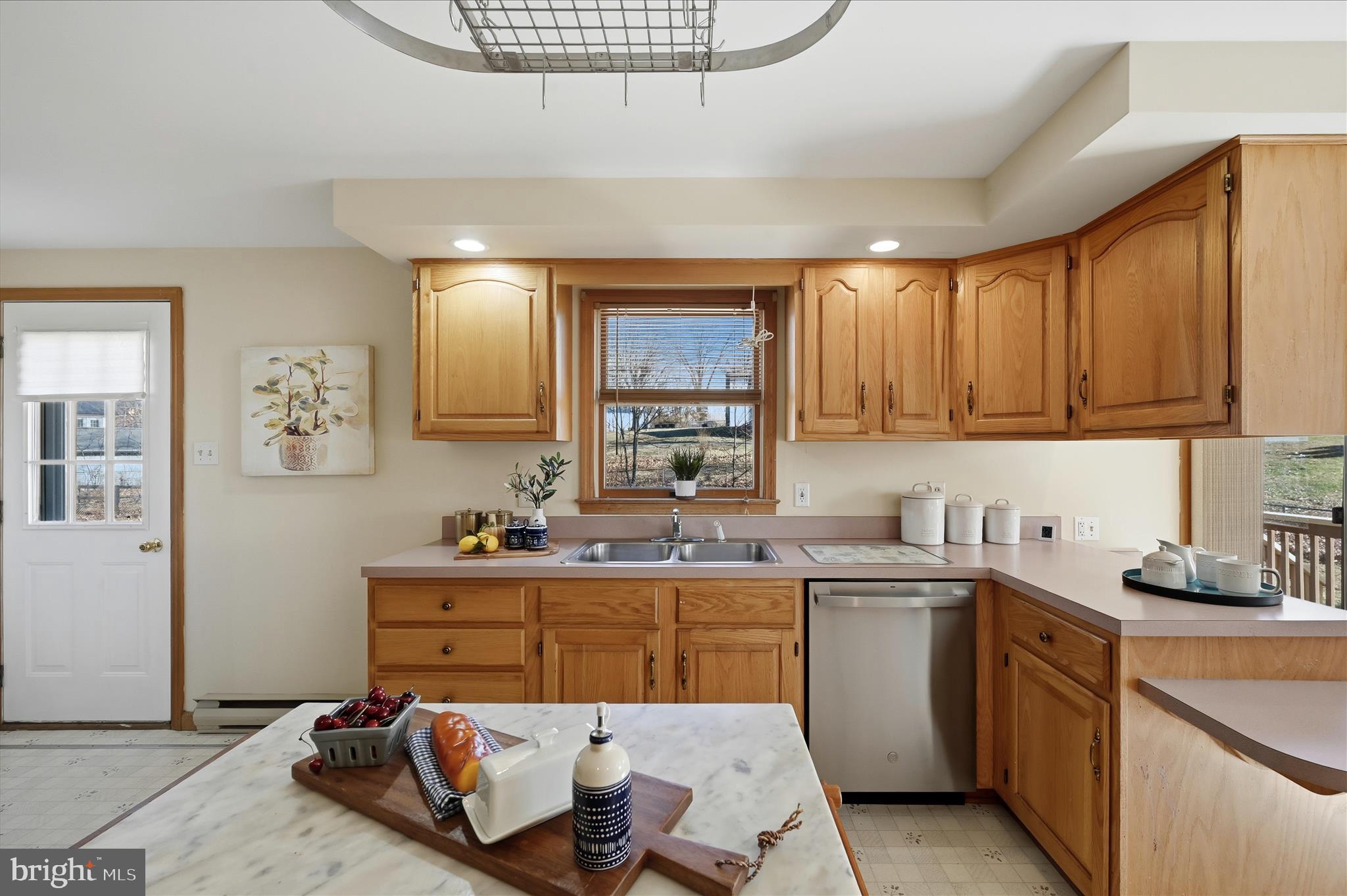 804 North Reymann Street Ranson, WV 25438 - Photo 17 of 53 a kitchen with a sink cabinets and window