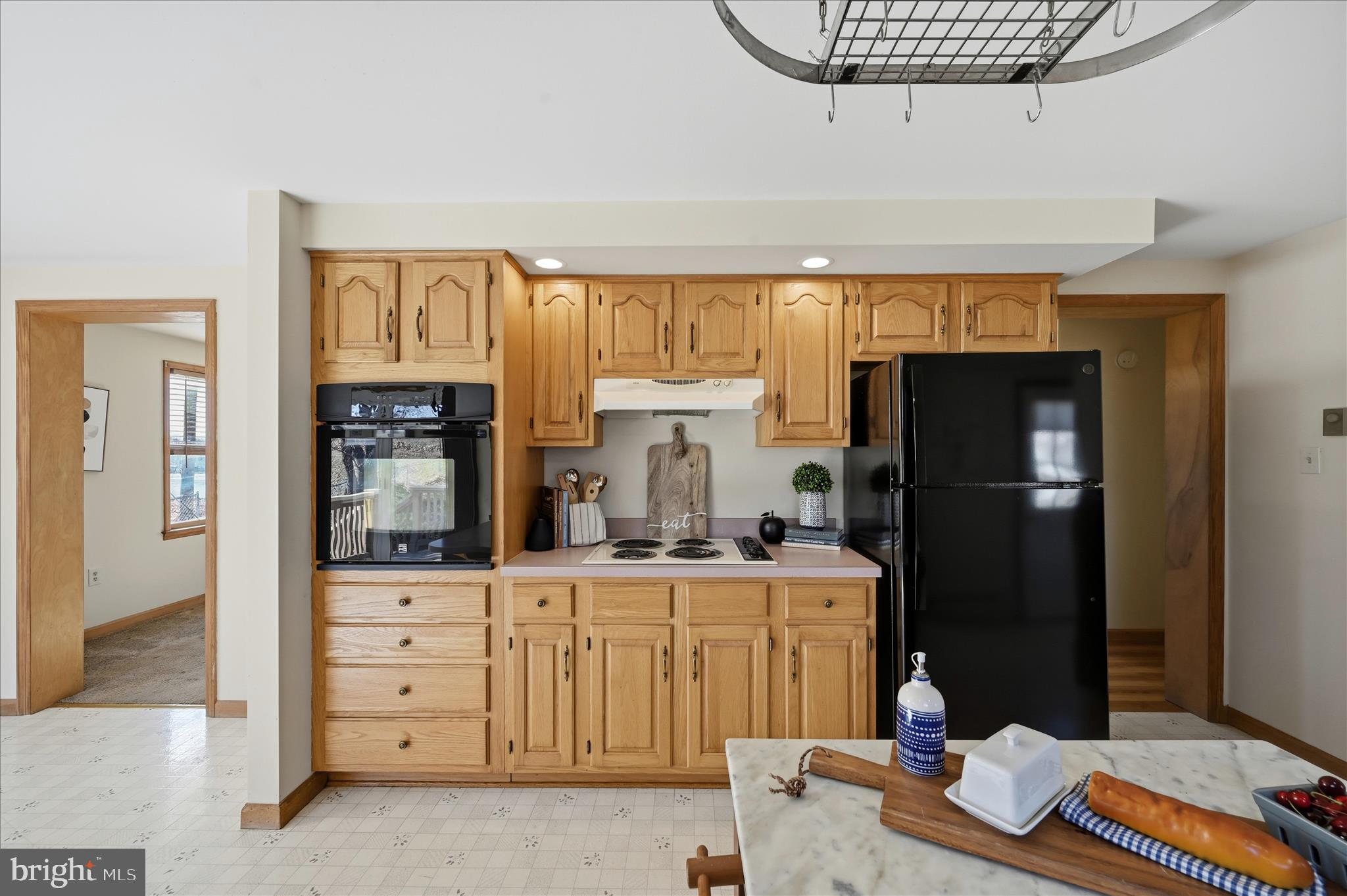 804 North Reymann Street Ranson, WV 25438 - Photo 19 of 53 a kitchen with stainless steel appliances kitchen island granite countertop a refrigerator and cabinets