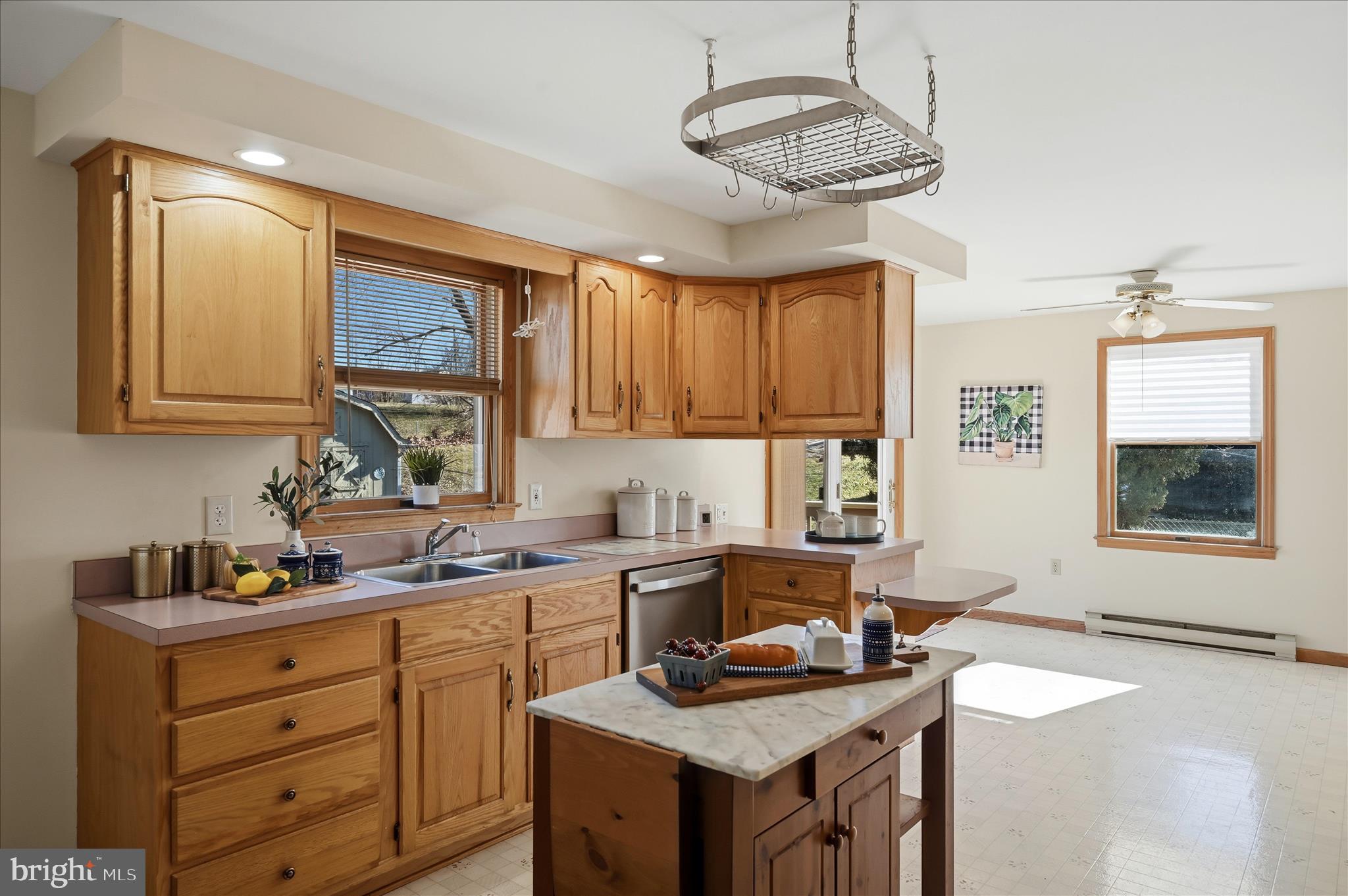804 North Reymann Street Ranson, WV 25438 - Photo 21 of 53 a kitchen with a sink stove and microwave