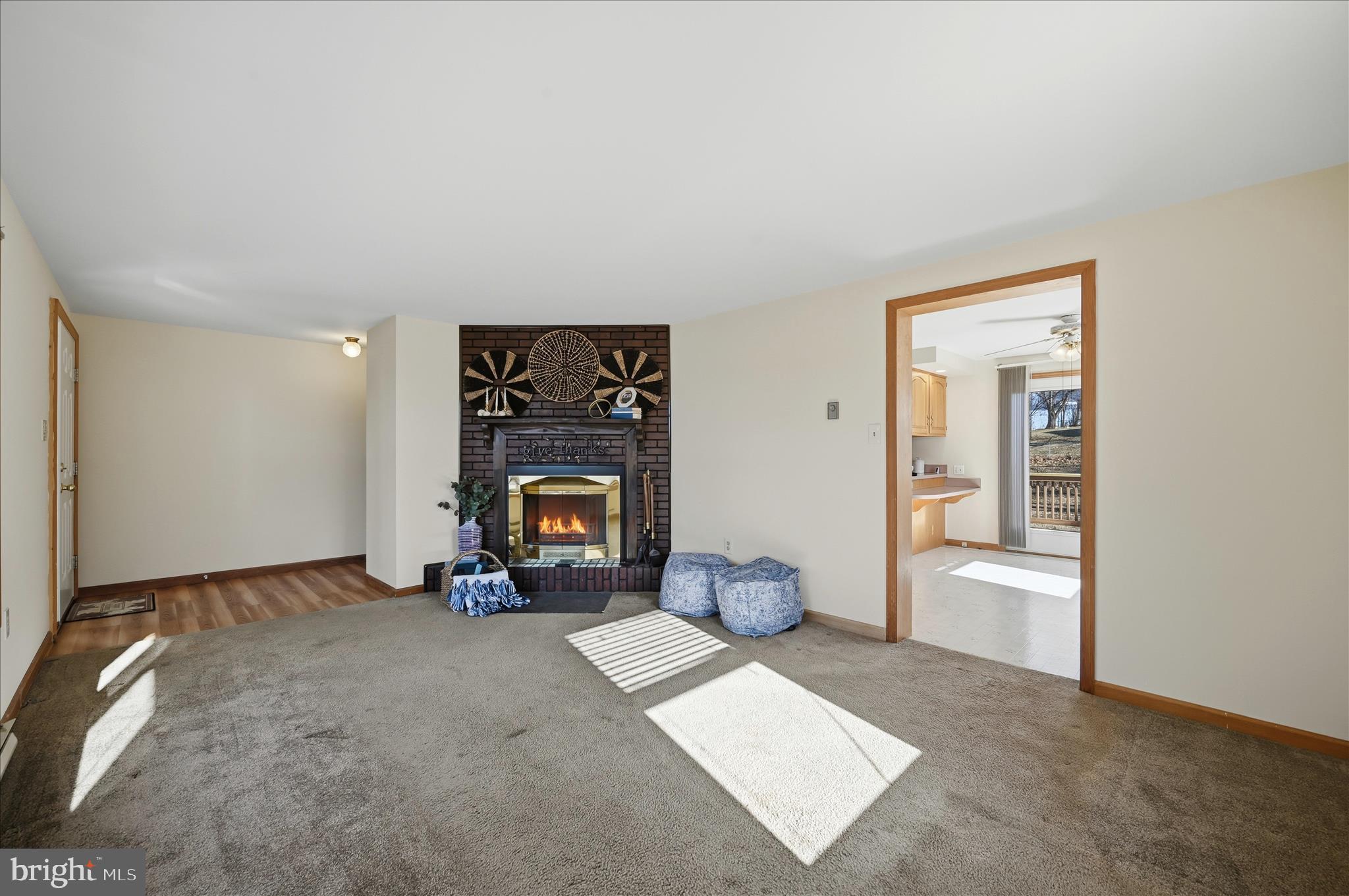 804 North Reymann Street Ranson, WV 25438 - Photo 6 of 53 a view of an empty room with a fireplace