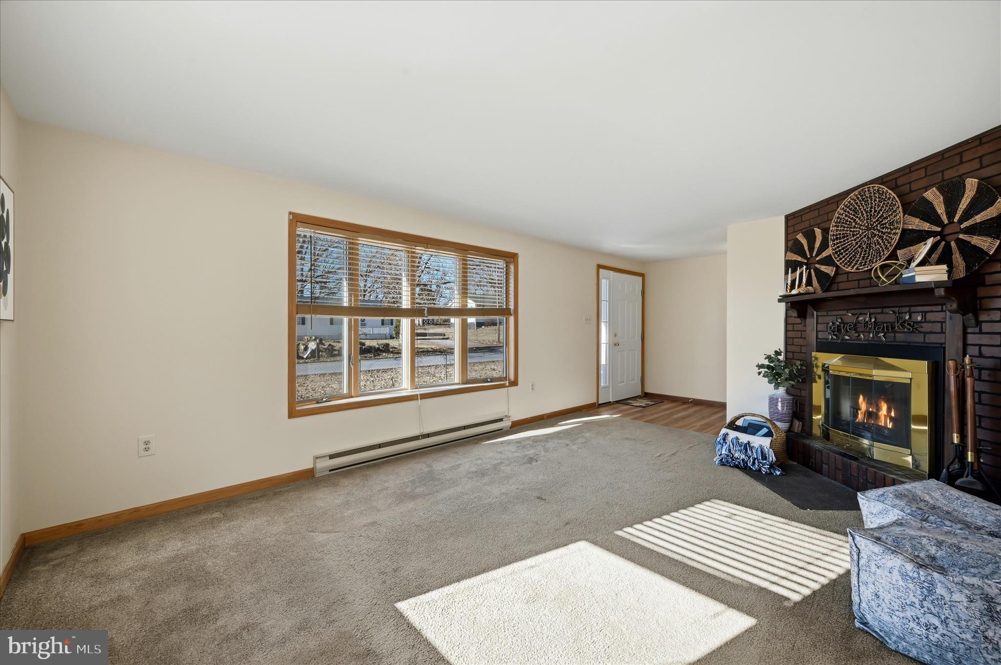 804 North Reymann Street Ranson, WV 25438 - Photo 8 of 53 a living room with furniture and a fireplace