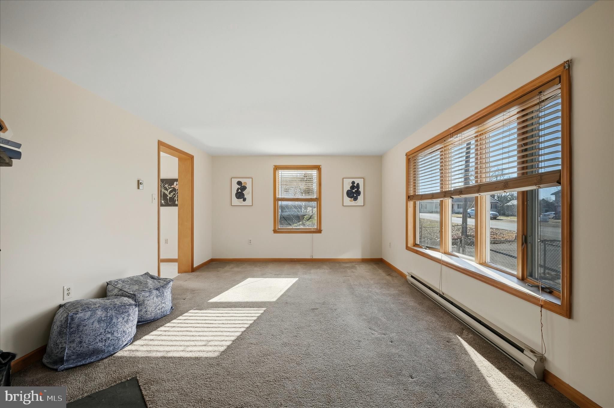 804 North Reymann Street Ranson, WV 25438 - Photo 9 of 53 a living room with furniture and a large window