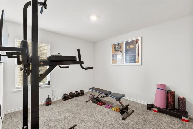 a view of a room with gym equipment