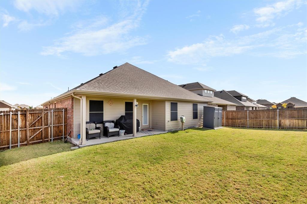 1302 Colonial Bluff Lane Princeton, TX 75407 - Photo 24 of 35 a view of a house with a yard and sitting area