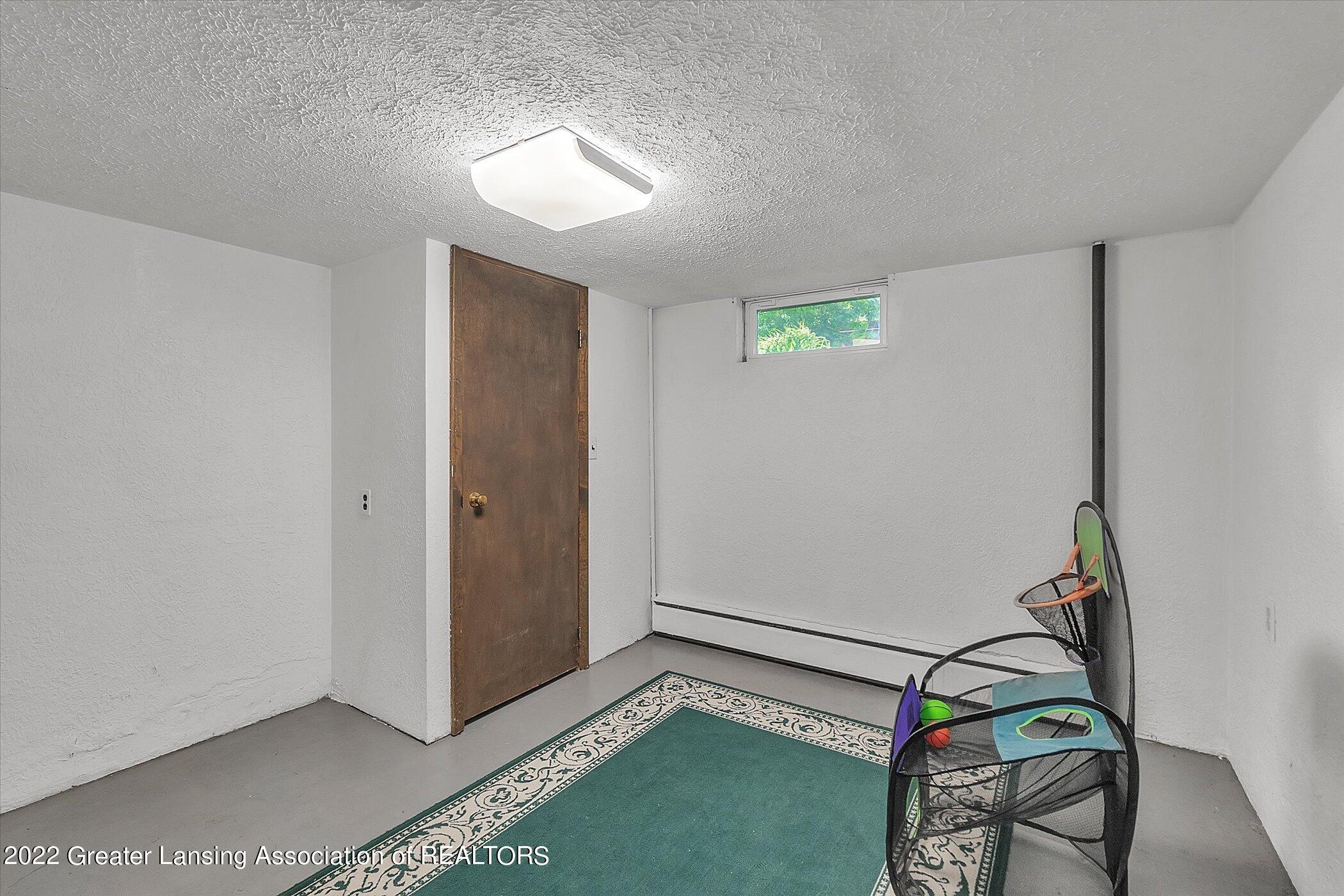 5080 Meridian Road Williamston, MI 48895 - Photo 26 of 32 Basement