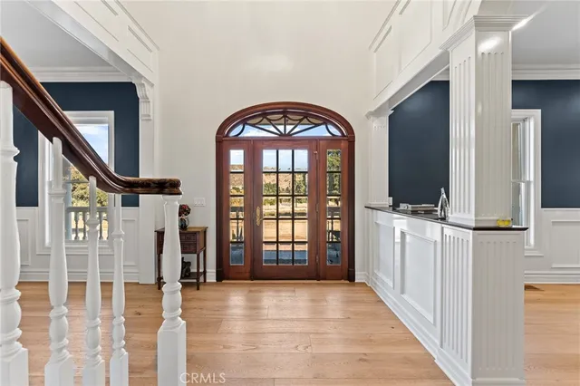 a kitchen with stainless steel appliances kitchen island granite countertop a large stove top oven and cabinets