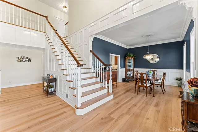 a kitchen with stainless steel appliances a sink and a refrigerator