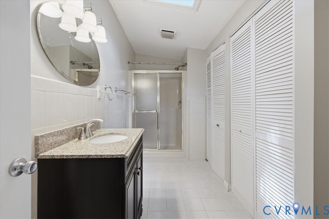 404 Bermuda Hundred Road Chester, VA 23836 - Photo 26 of 37 Bathroom featuring a dark wood-finish vanity with