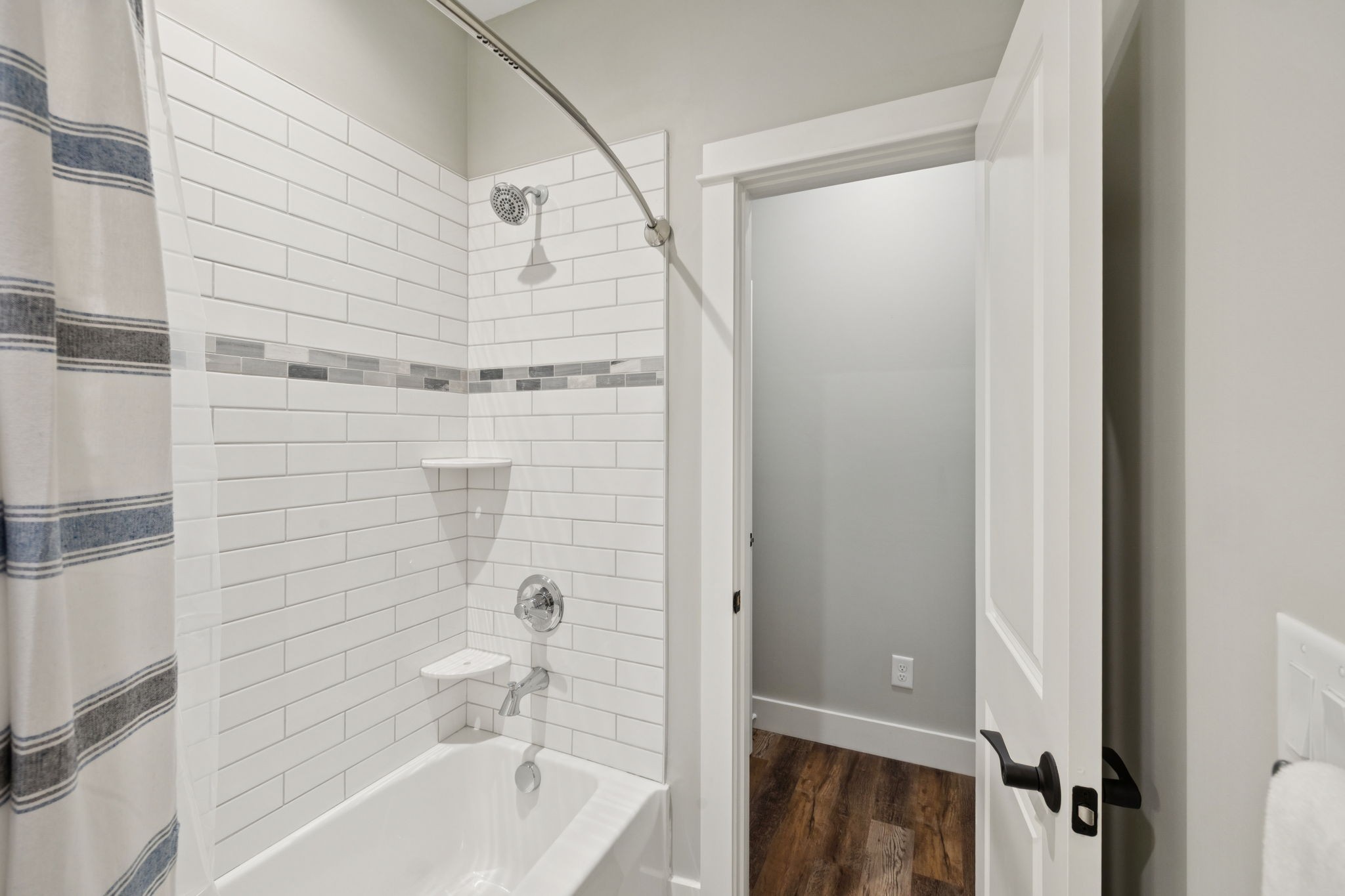 7903 Daugherty-Capley Road Primm Springs, TN 38476 - Photo 37 of 92 a bathroom with a bathtub and a shower
