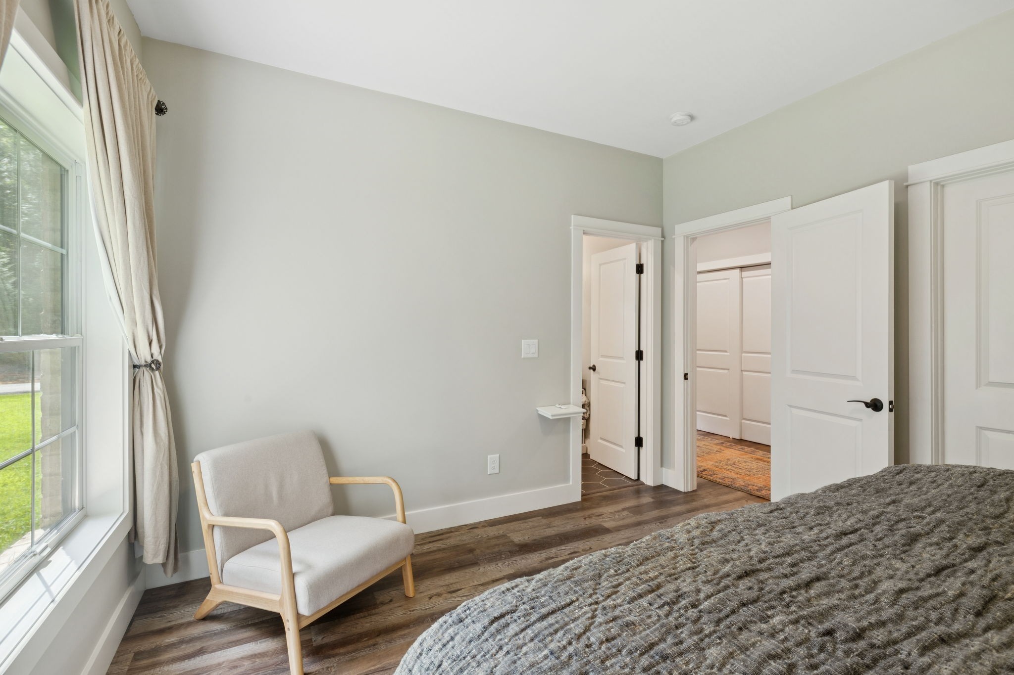 7903 Daugherty-Capley Road Primm Springs, TN 38476 - Photo 41 of 92 a bedroom with a bed and a chair