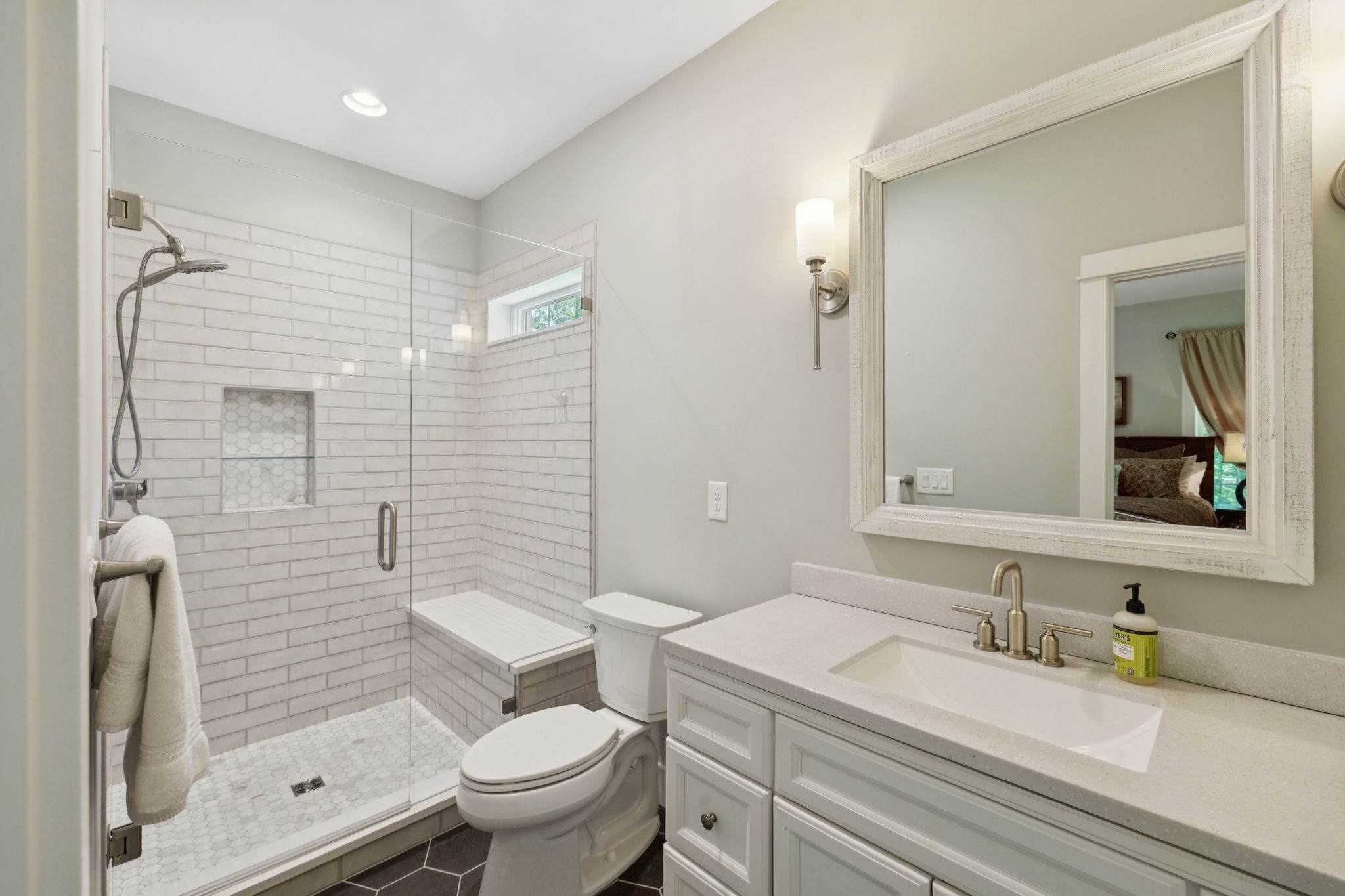 7903 Daugherty-Capley Road Primm Springs, TN 38476 - Photo 42 of 92 a bathroom with a granite countertop sink a toilet and shower