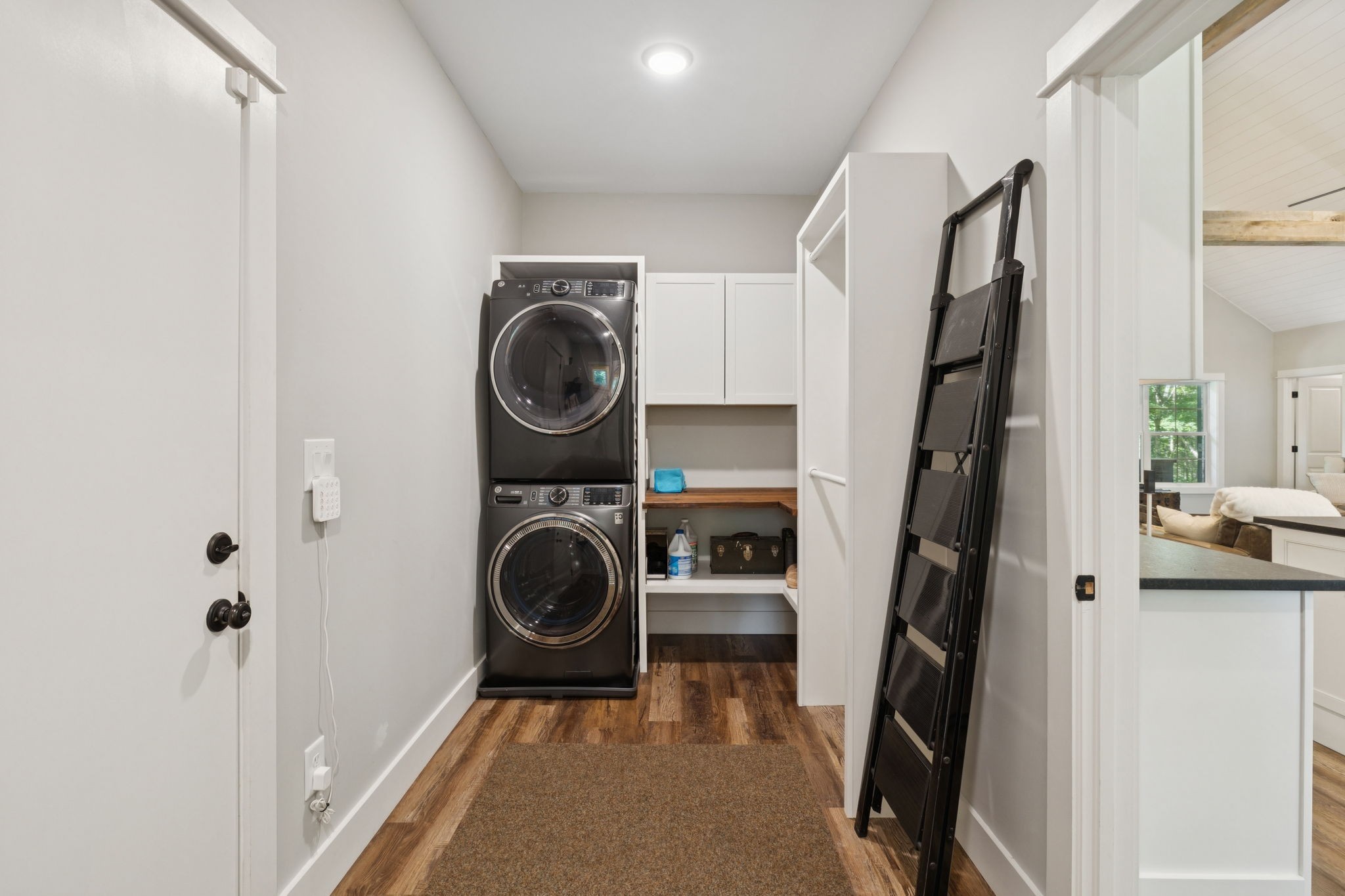 7903 Daugherty-Capley Road Primm Springs, TN 38476 - Photo 44 of 92 a view of walk in closet with clothes washer and dryer