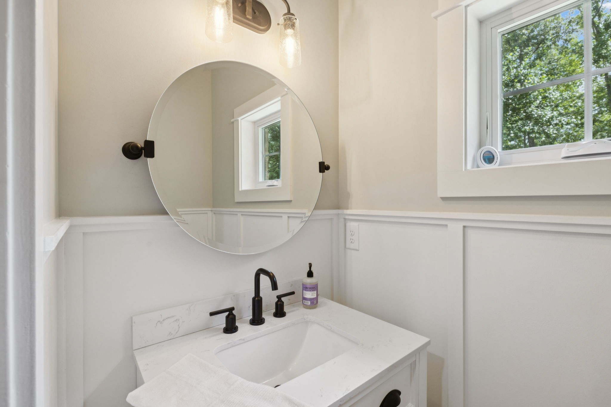 7903 Daugherty-Capley Road Primm Springs, TN 38476 - Photo 45 of 92 a bathroom with a sink and a mirror