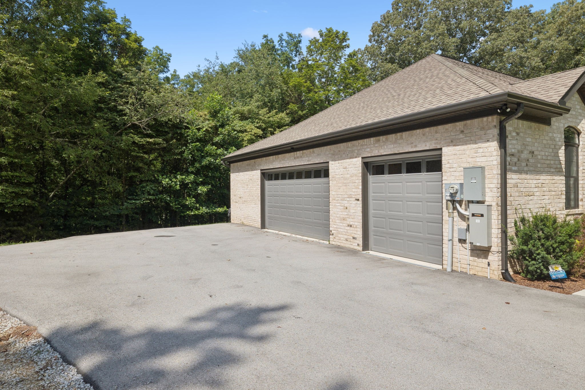 7903 Daugherty-Capley Road Primm Springs, TN 38476 - Photo 53 of 92 a front view of a house with a yard and garage