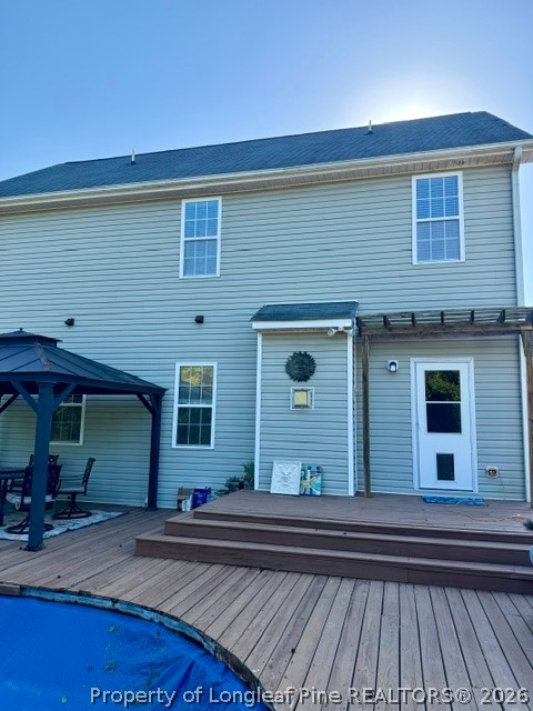 1284 L Cooper Road Cameron, NC 28326 - Photo 19 of 24 a view of a house with a patio