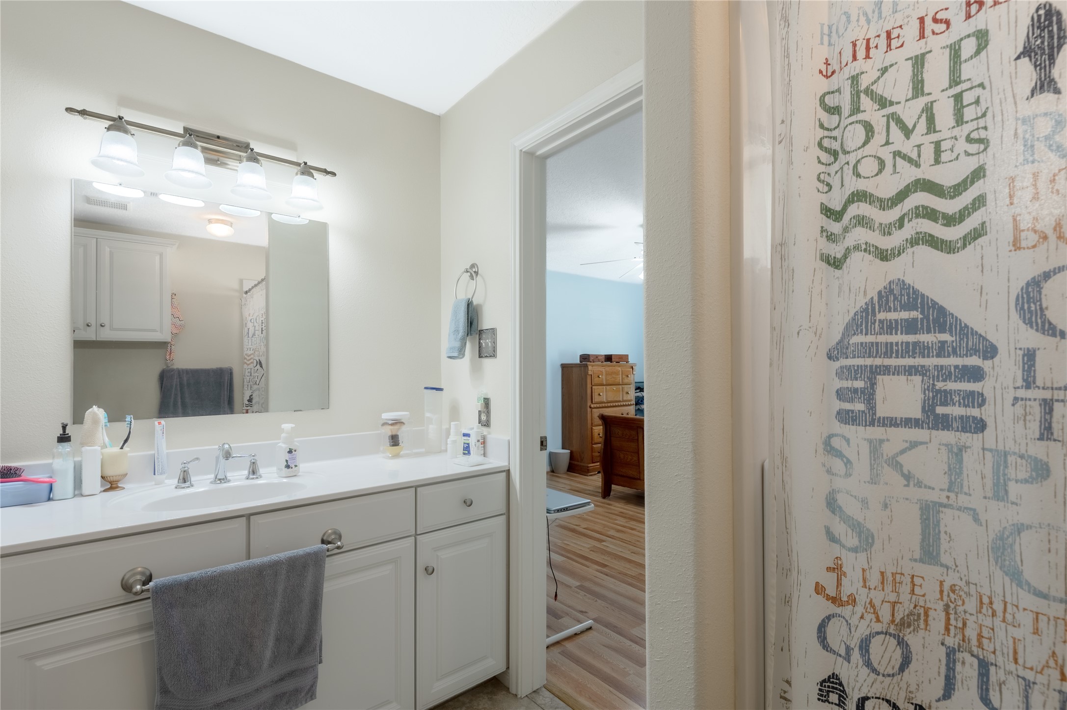 15 Lake Side Trinity, TX 75862 - Photo 26 of 33 a bathroom with a double vanity sink mirror and shower