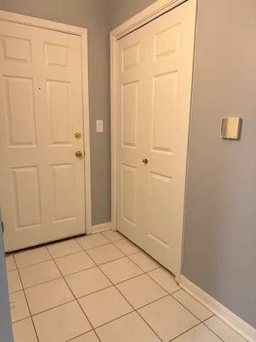 a bathroom with a toilet a sink and shower