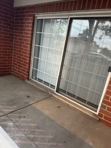 a view of backyard with a large space