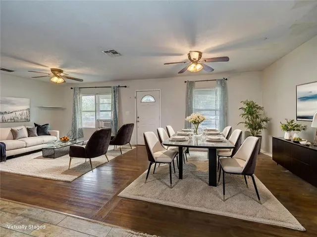 a view of a dining room with furniture