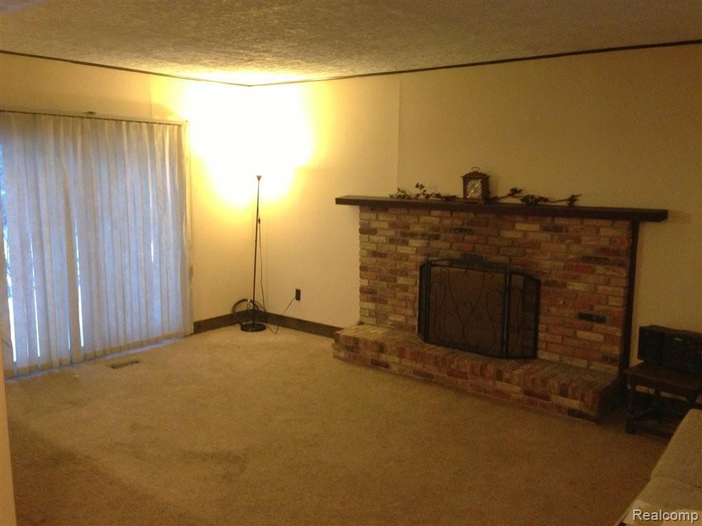 922 Dickson Lane Rochester, MI 48307 - Photo 15 of 16 Living Room with Fireplace