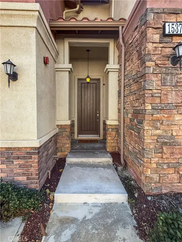 a front view of a house with a garage