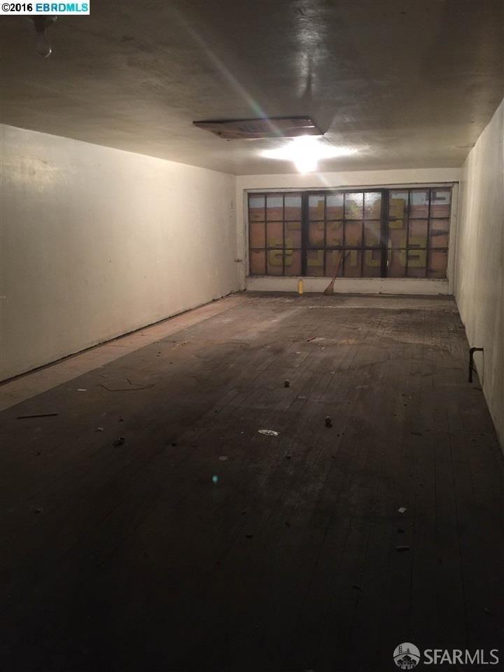 528 7th Street Oakland, CA 94607 - Photo 4 of 5 a view of an empty room with a window