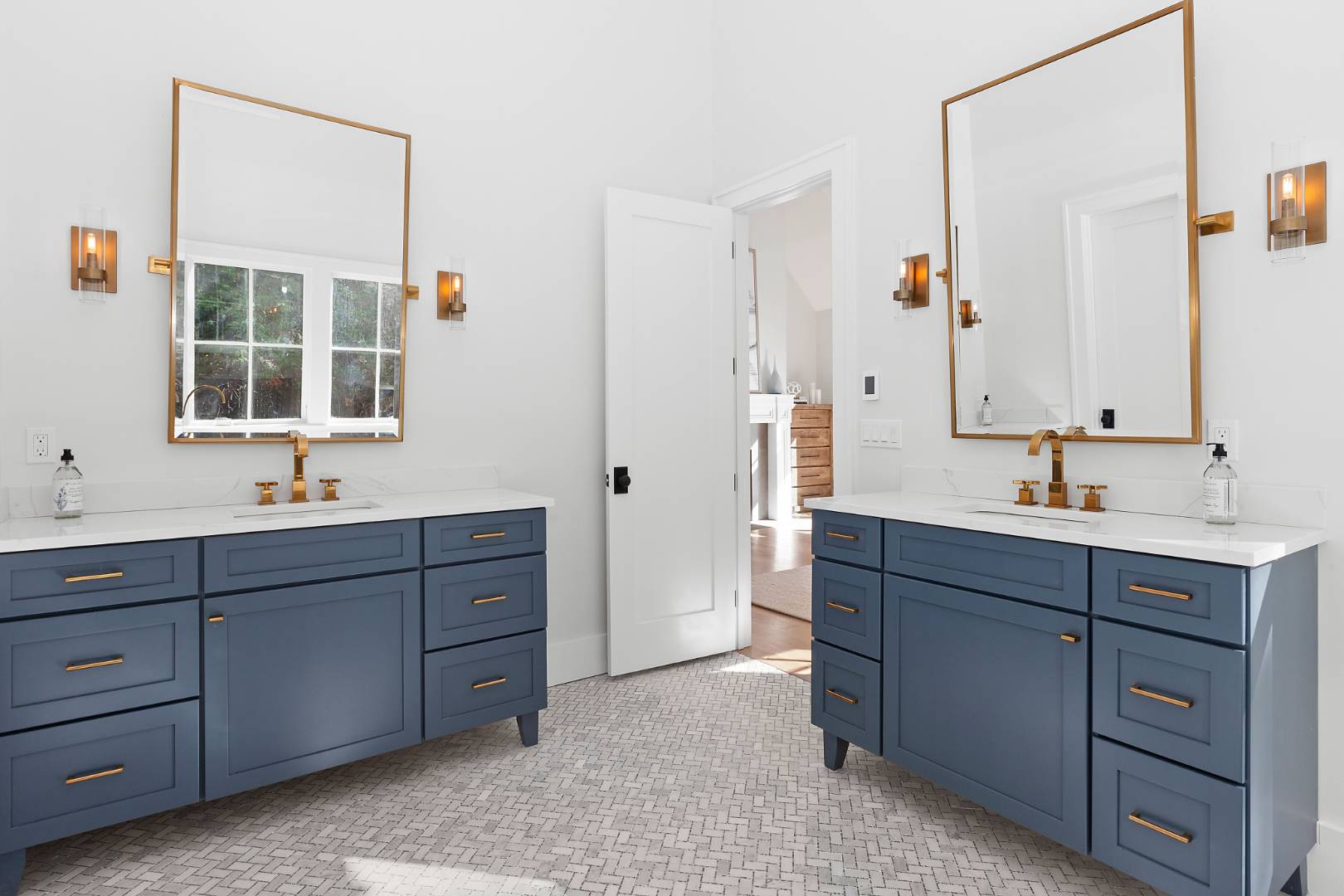 8 Greenway Drive East Hampton, NY 11937 - Photo 16 of 38 a bathroom with a sink double vanity and a mirror