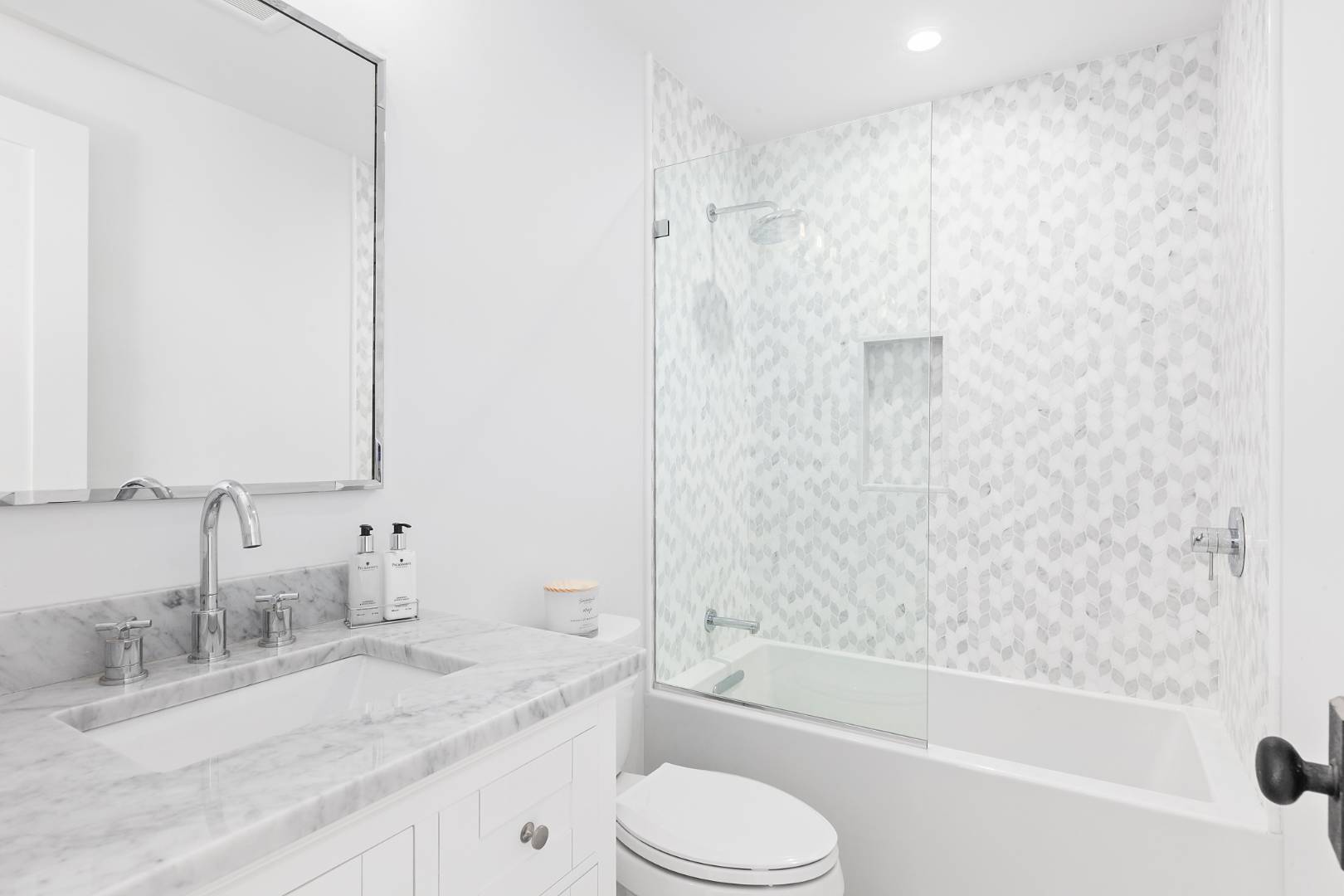 8 Greenway Drive East Hampton, NY 11937 - Photo 23 of 38 a bathroom with a granite countertop sink toilet and shower
