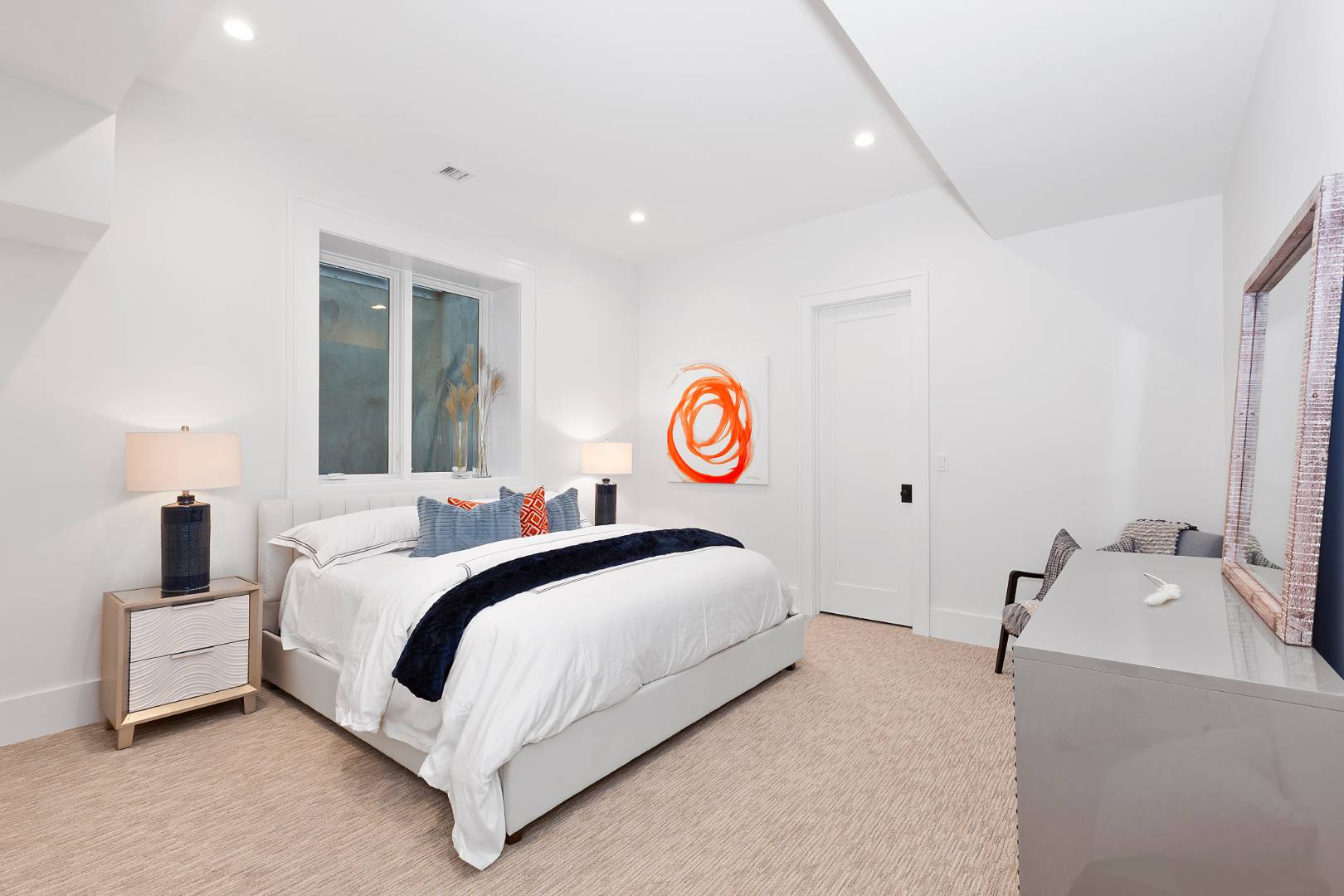 8 Greenway Drive East Hampton, NY 11937 - Photo 30 of 38 a spacious bedroom with a bed and a window