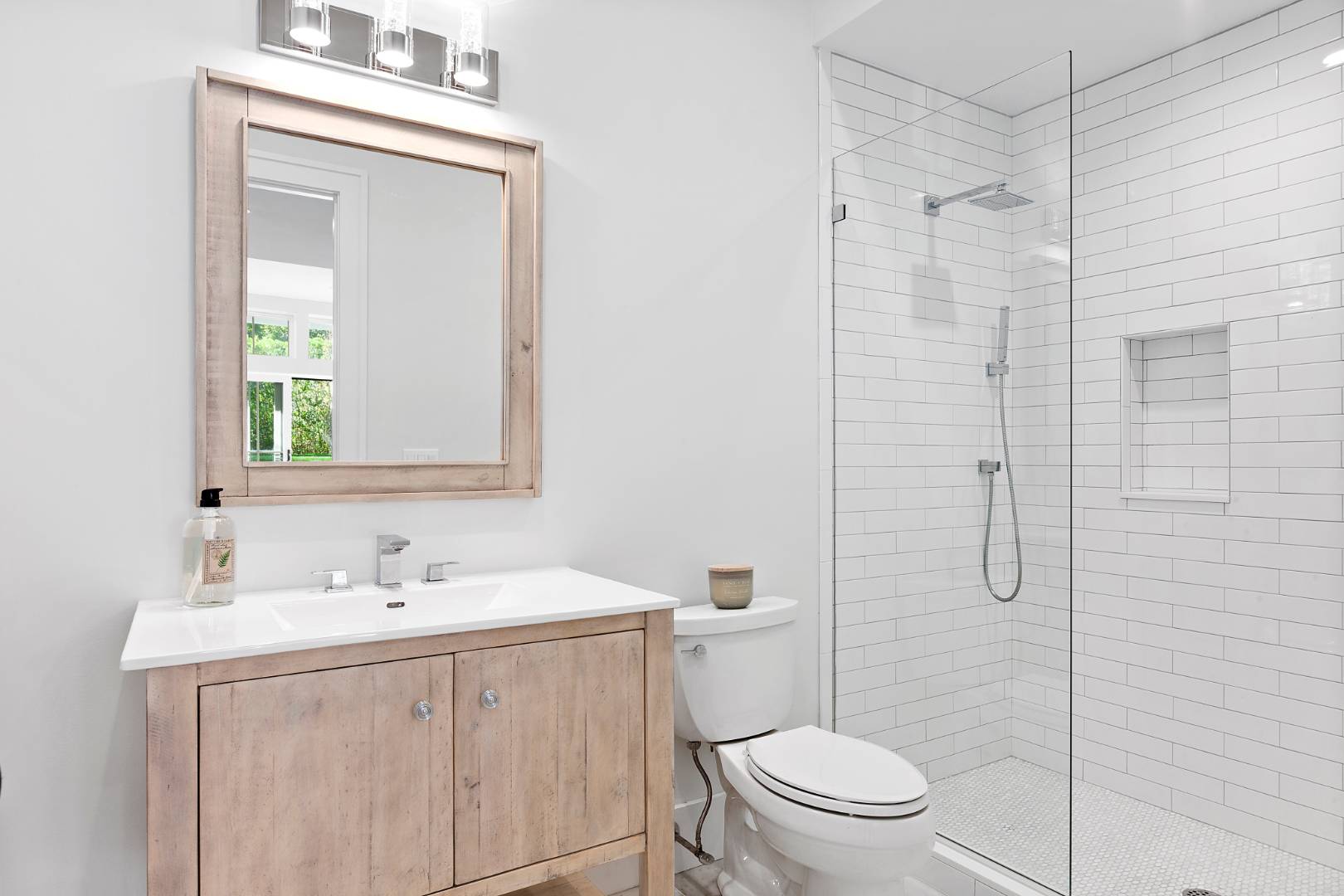 8 Greenway Drive East Hampton, NY 11937 - Photo 33 of 38 a bathroom with a sink a toilet and shower