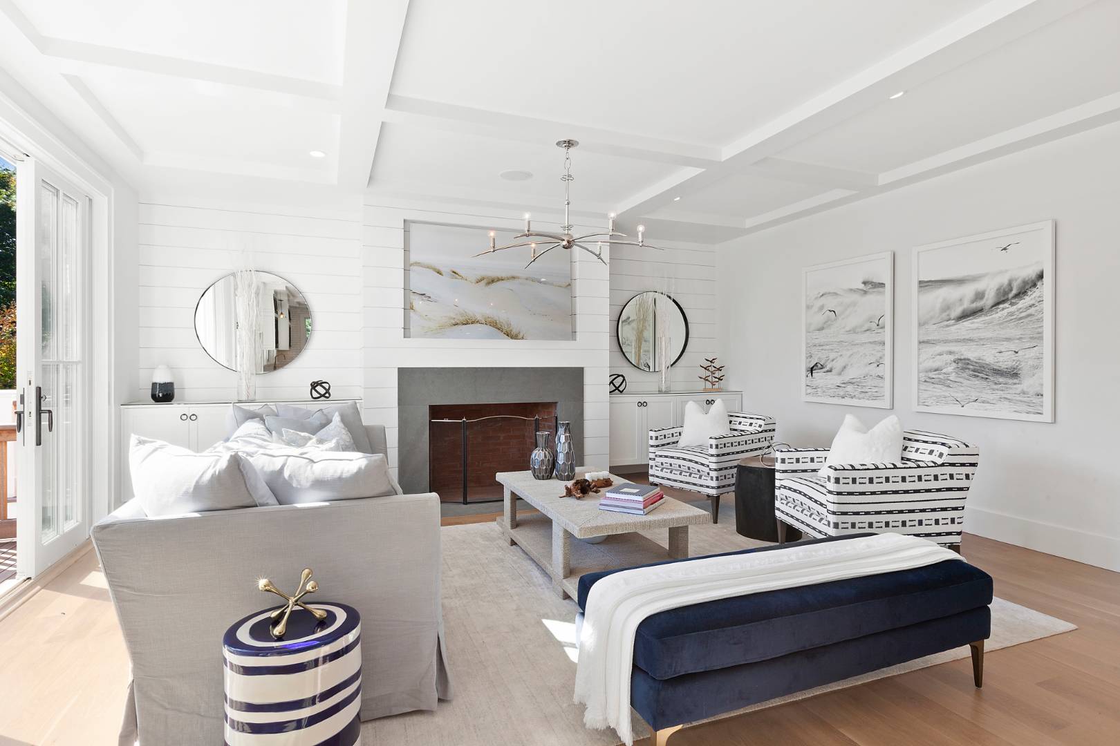 8 Greenway Drive East Hampton, NY 11937 - Photo 8 of 38 a living room with furniture chandelier and a fireplace