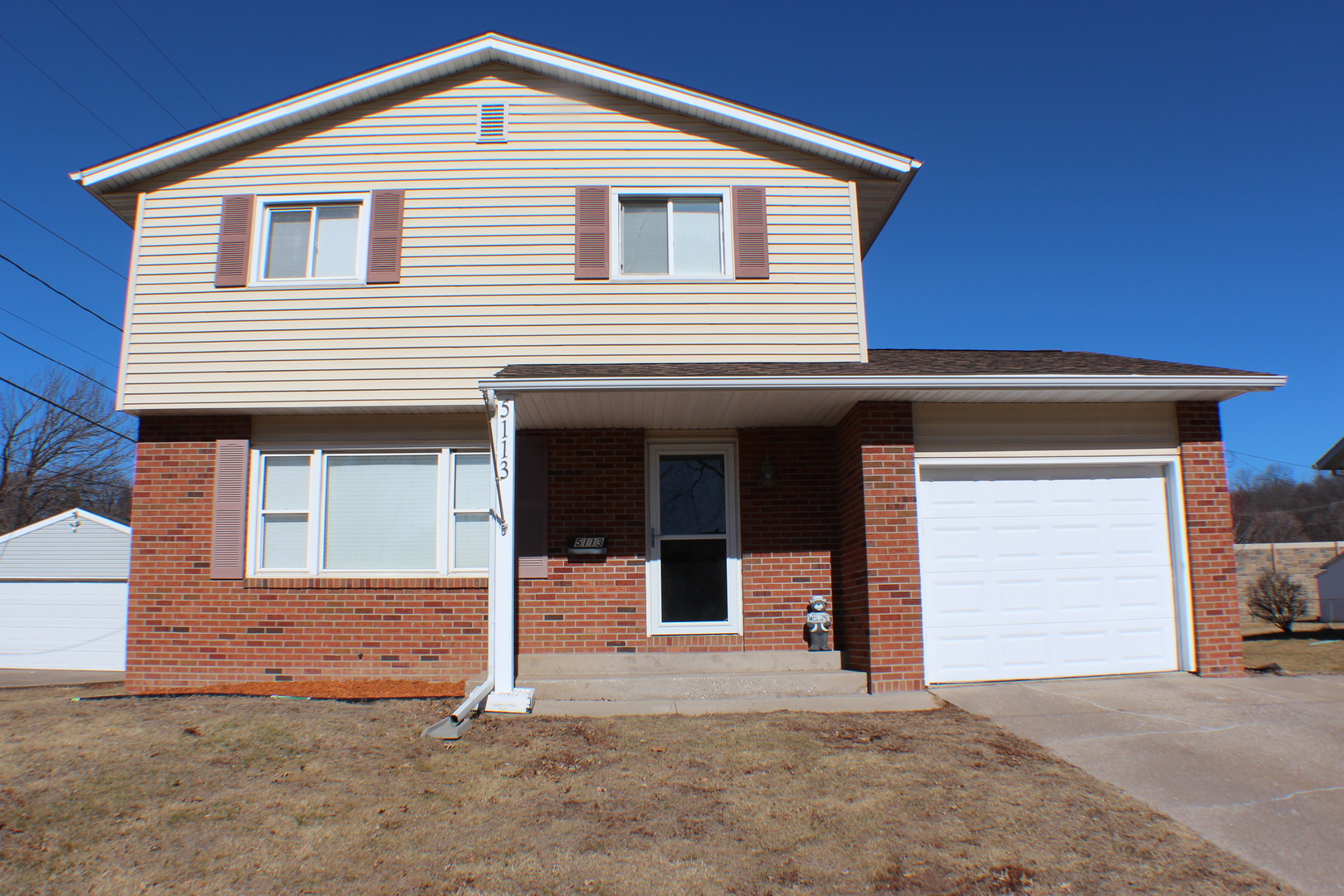 5113 44th Avenue Moline, IL 61265 - Photo 1 of 30 a front view of a house