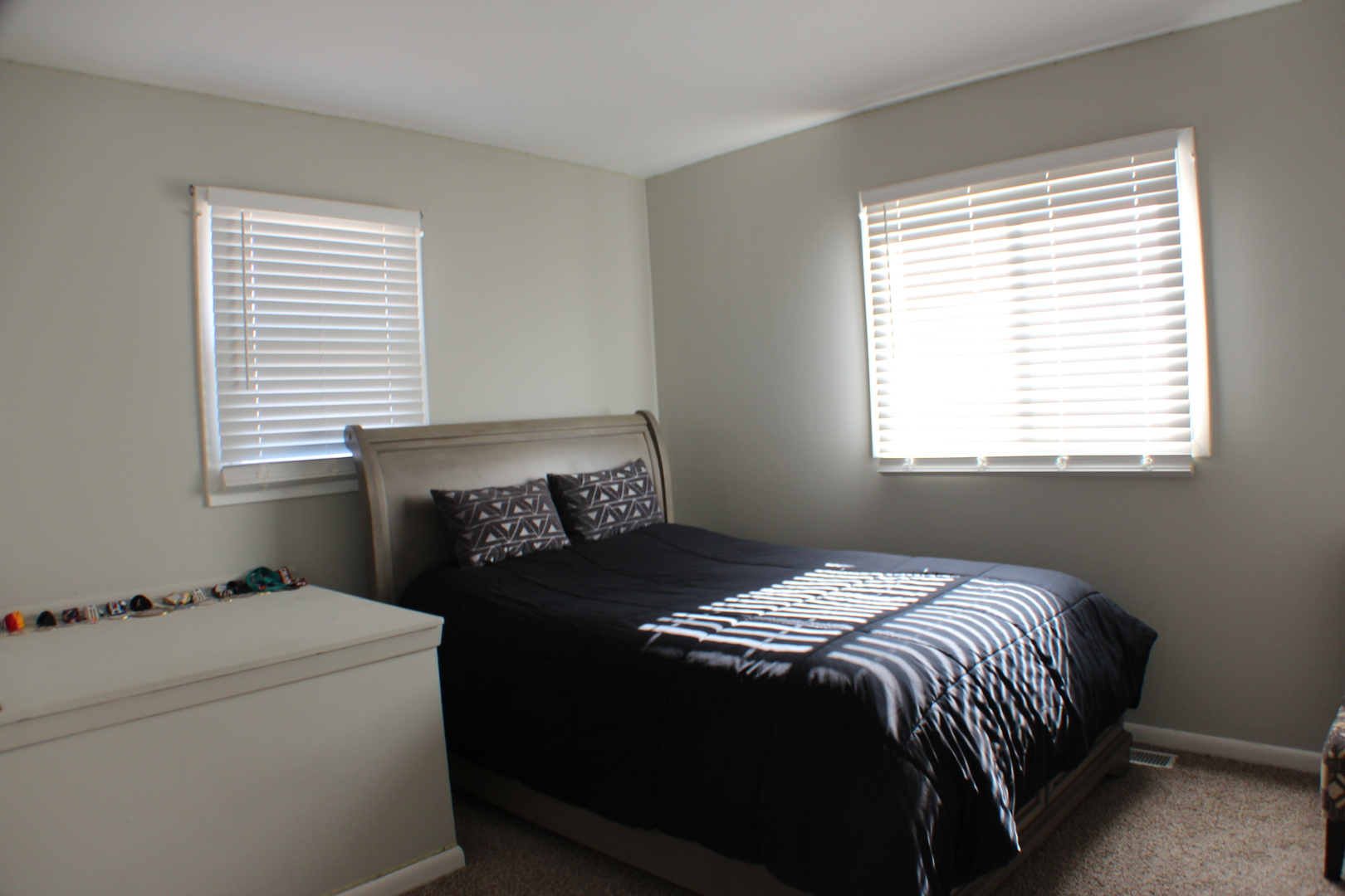 5113 44th Avenue Moline, IL 61265 - Photo 11 of 30 a bedroom with a bed and a window