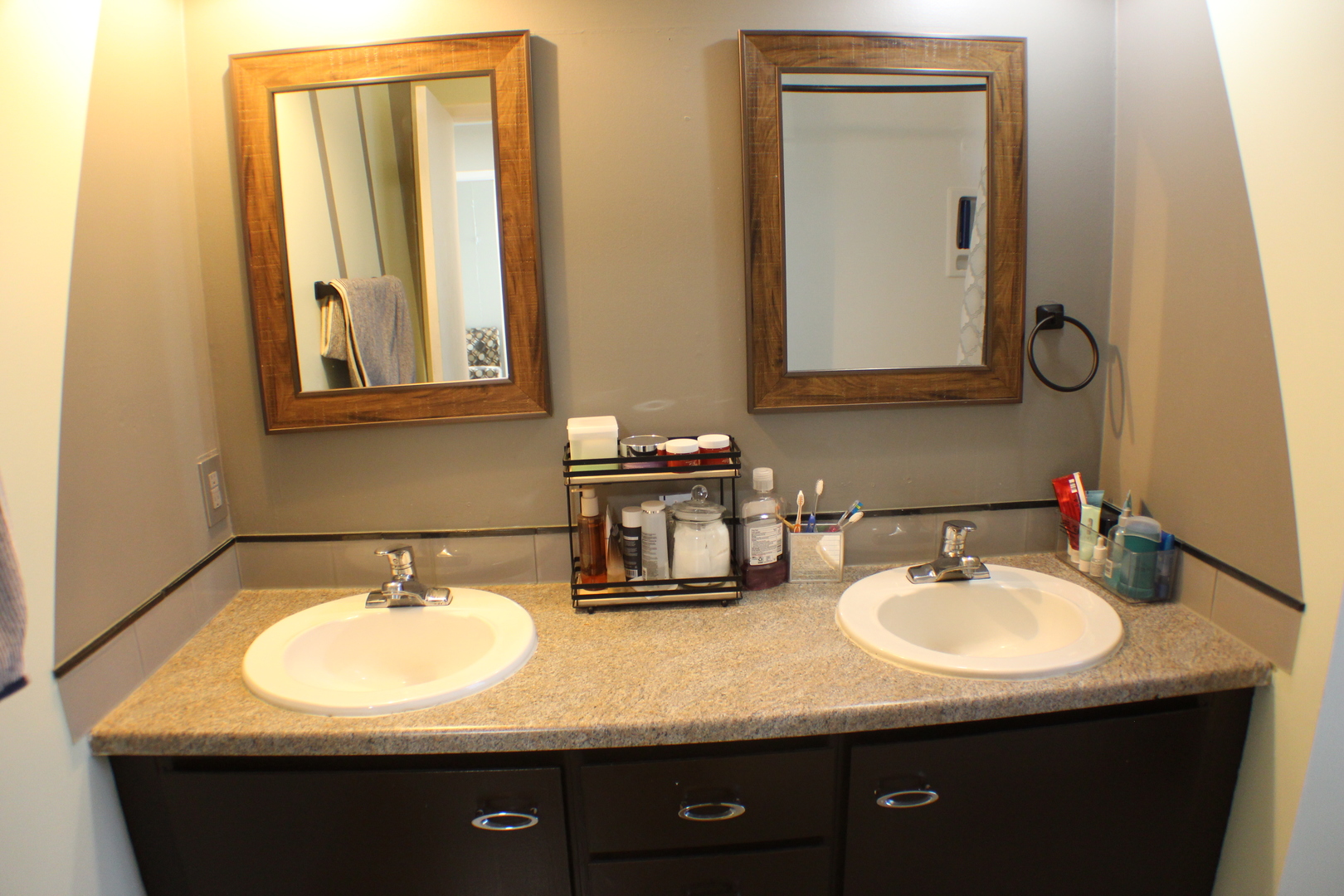5113 44th Avenue Moline, IL 61265 - Photo 18 of 30 a bathroom with a double vanity sink and a mirror