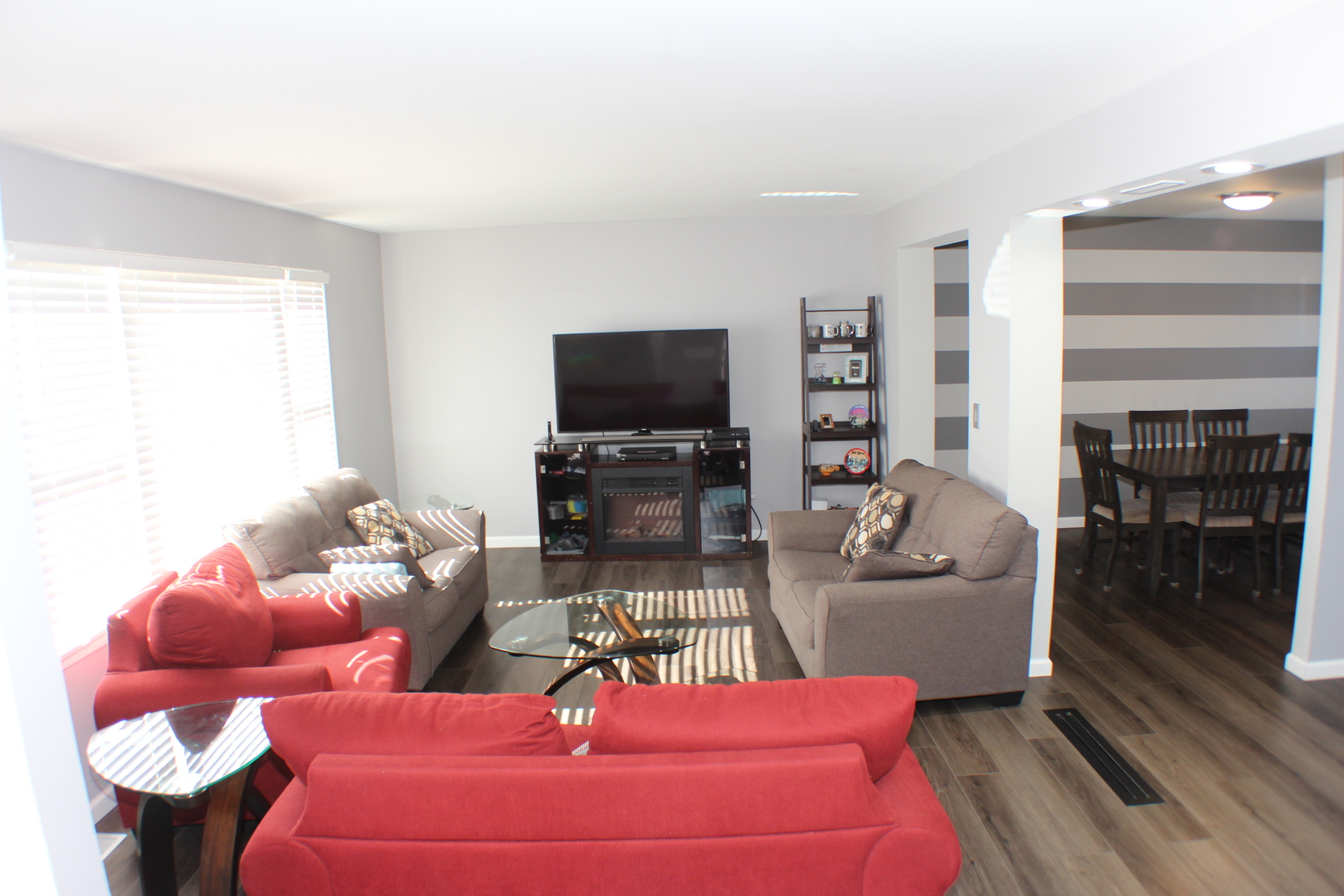5113 44th Avenue Moline, IL 61265 - Photo 2 of 30 a living room with furniture and a flat screen tv