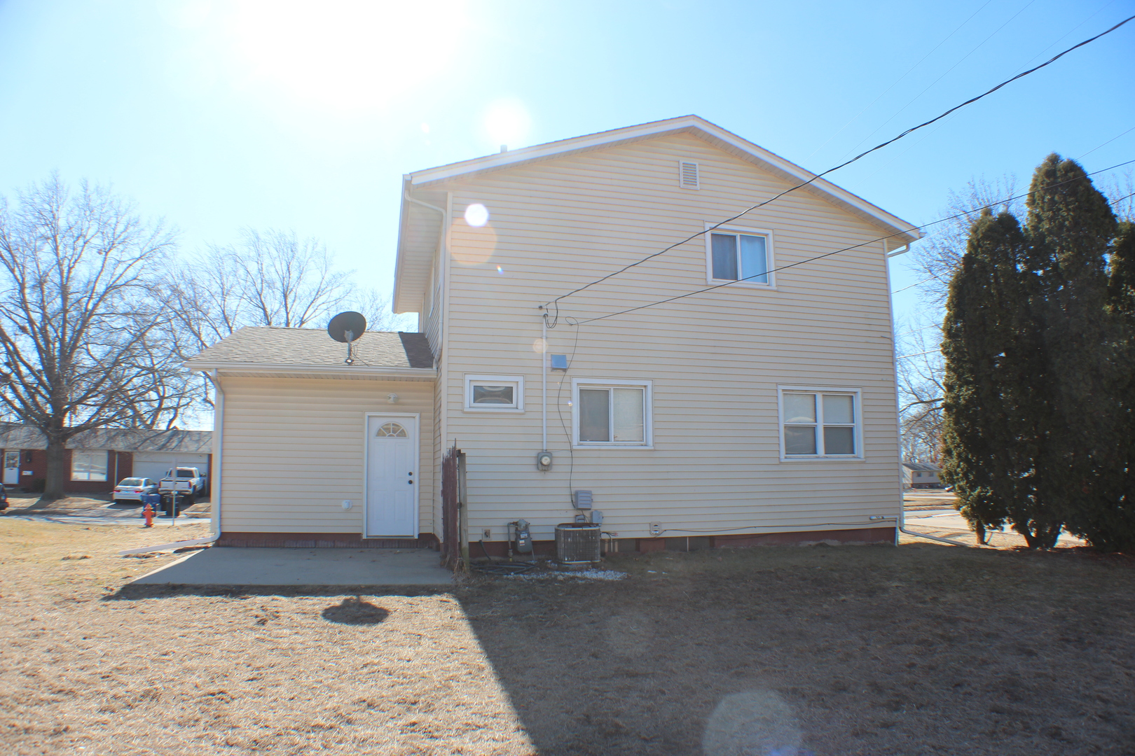 5113 44th Avenue Moline, IL 61265 - Photo 26 of 30 a view of a white house with a yard
