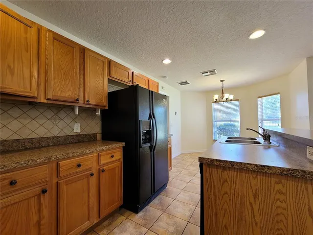 $299,999 | 1914 Commander Way, Kissimmee, FL 34746