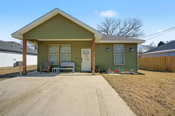 a front view of a house with a garage