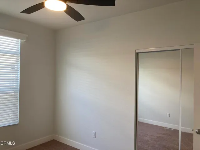 a bathroom with a shower and a toilet