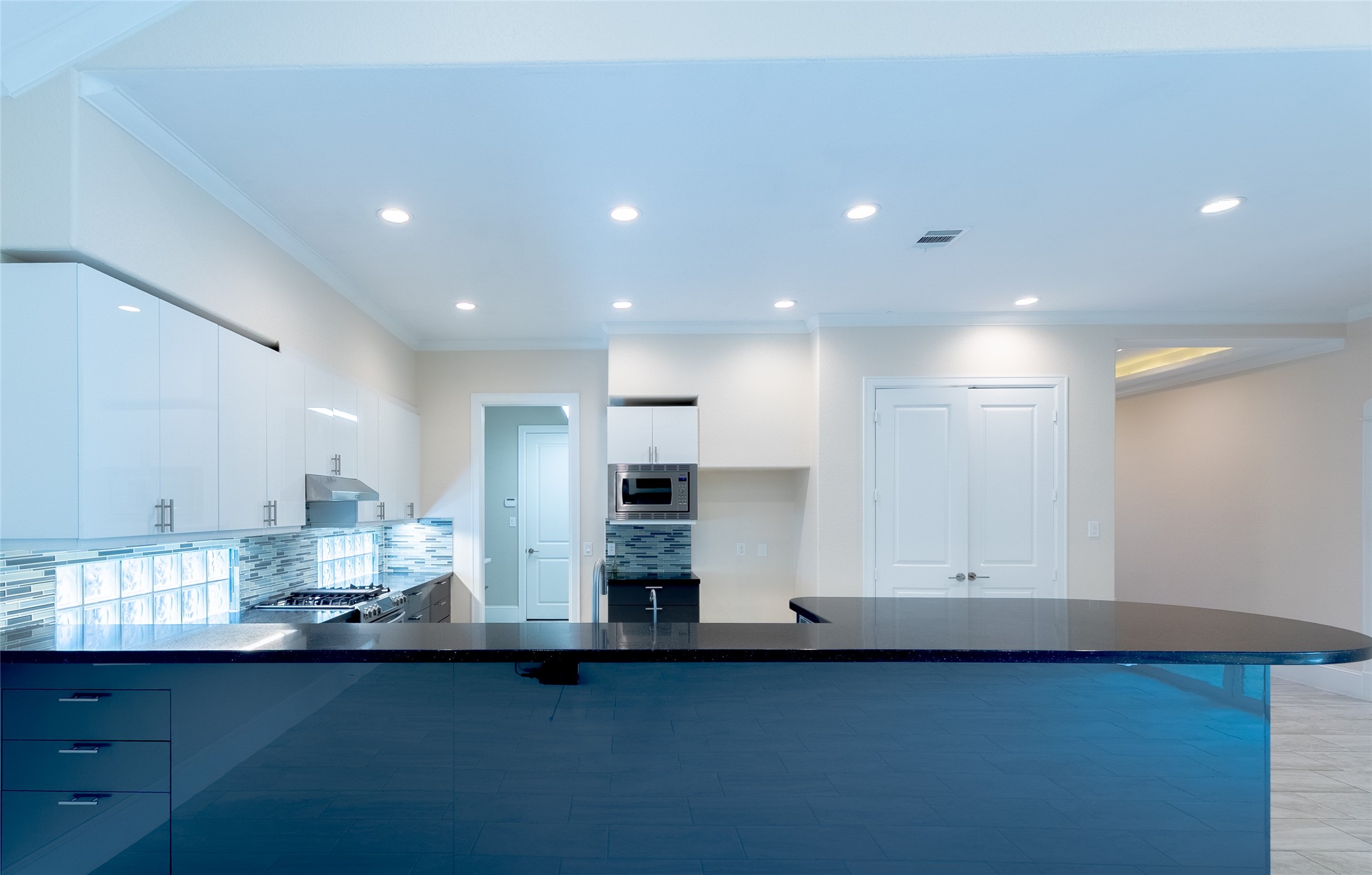 25718 Muirfield Bend Court Spring, TX 77389 - Photo 17 of 50 a view of kitchen with wooden floor