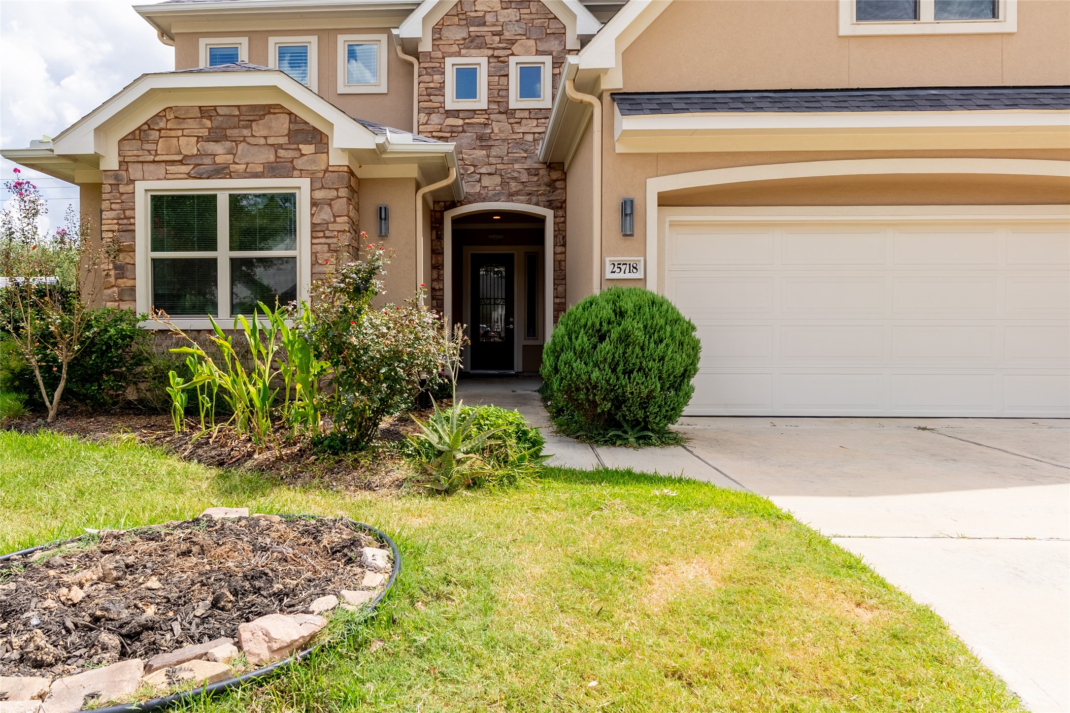 25718 Muirfield Bend Court Spring, TX 77389 - Photo 2 of 50 a view of outdoor space yard and front view of a house