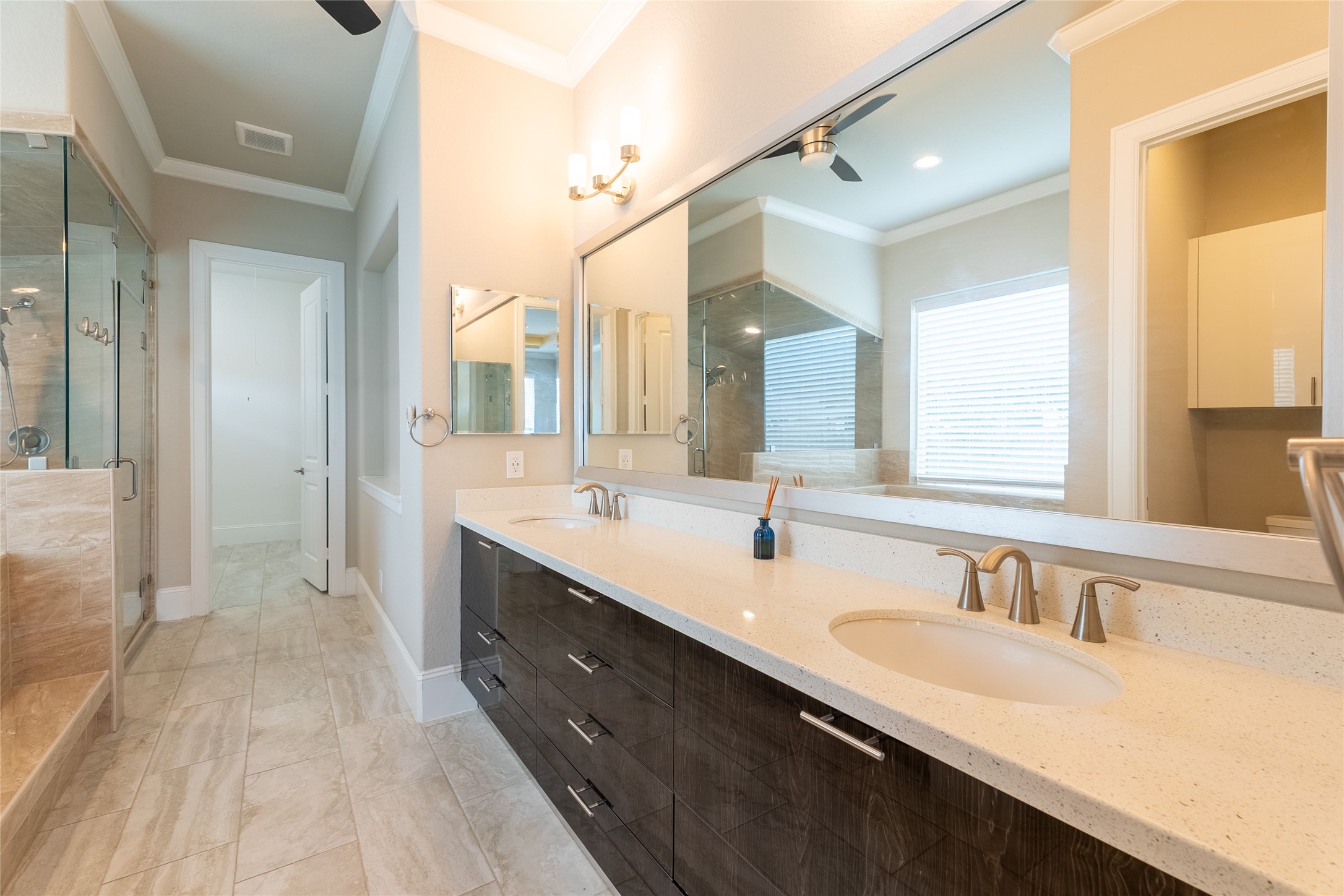 25718 Muirfield Bend Court Spring, TX 77389 - Photo 28 of 50 a spacious bathroom with a double vanity sink mirror and double