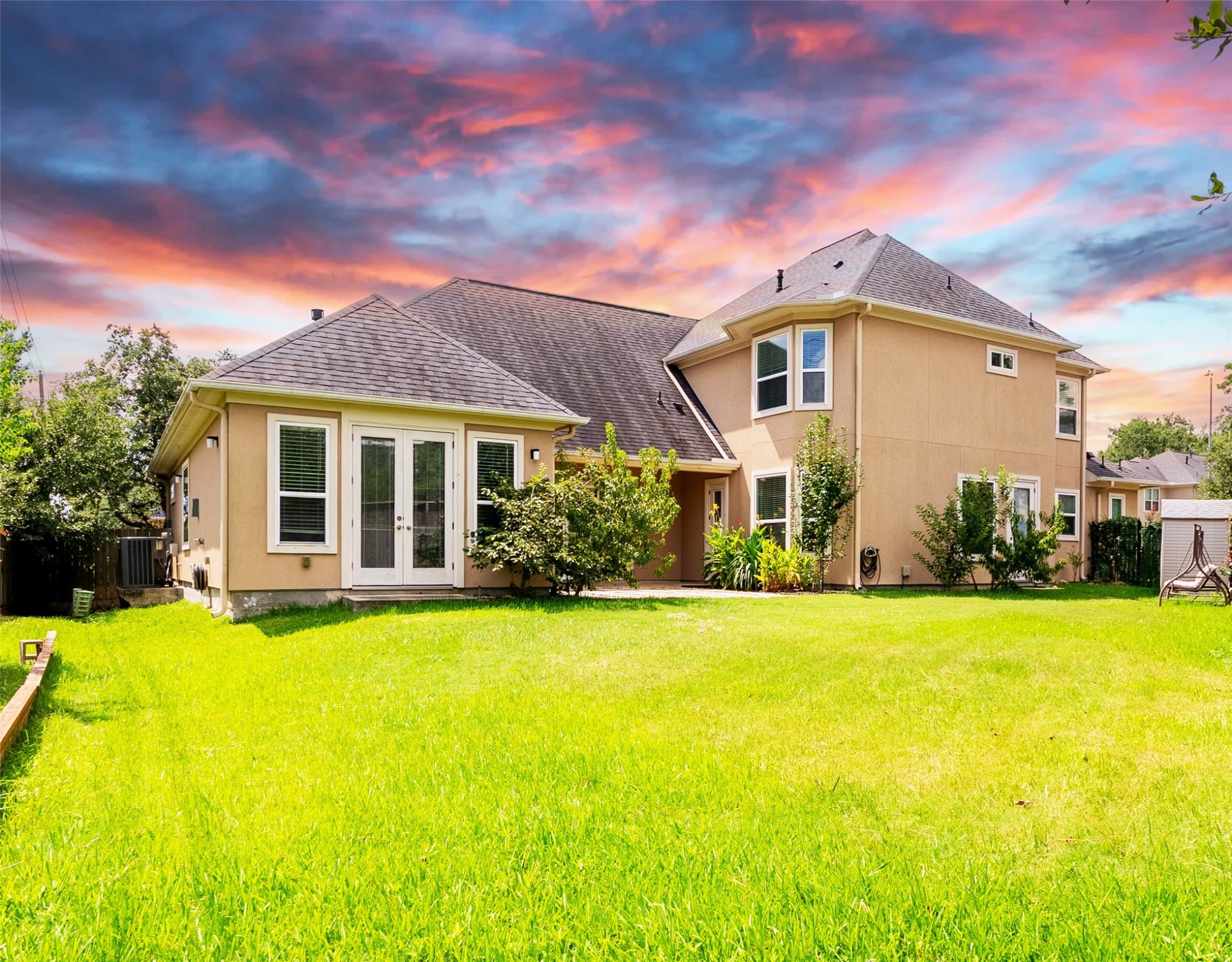 25718 Muirfield Bend Court Spring, TX 77389 - Photo 44 of 50 a front view of house with yard and trees in the background