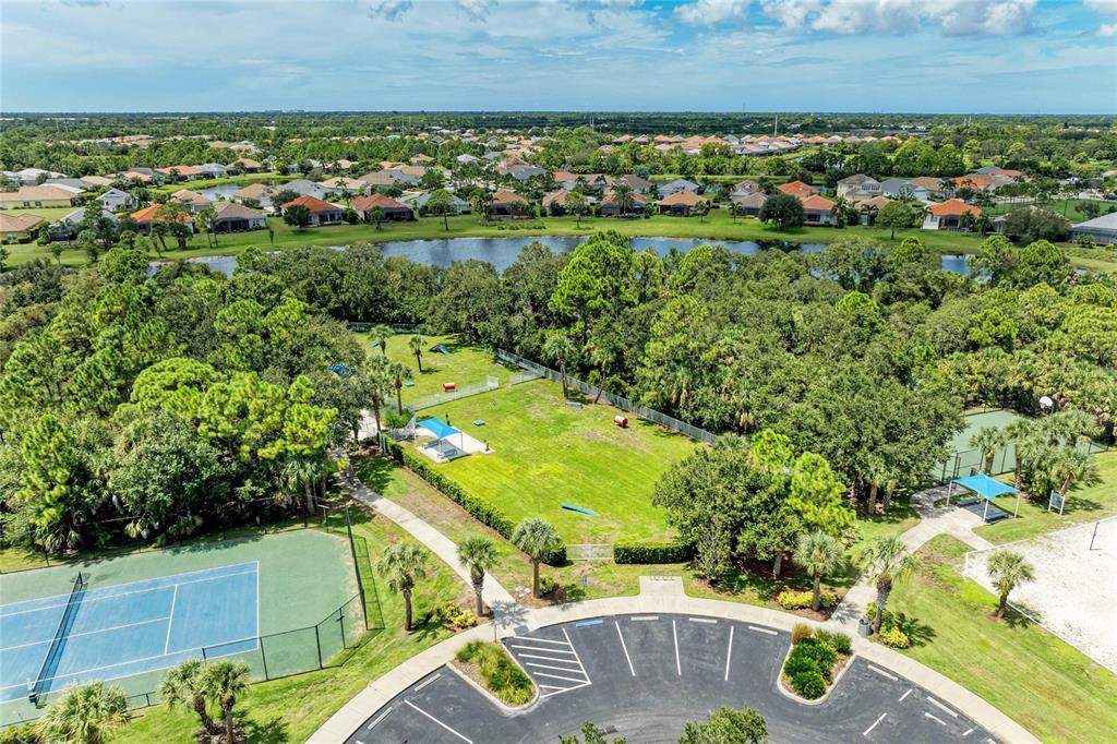 12642 Harney Street Venice, FL 34293 - Photo 66 of 85 an aerial view of a house with a yard