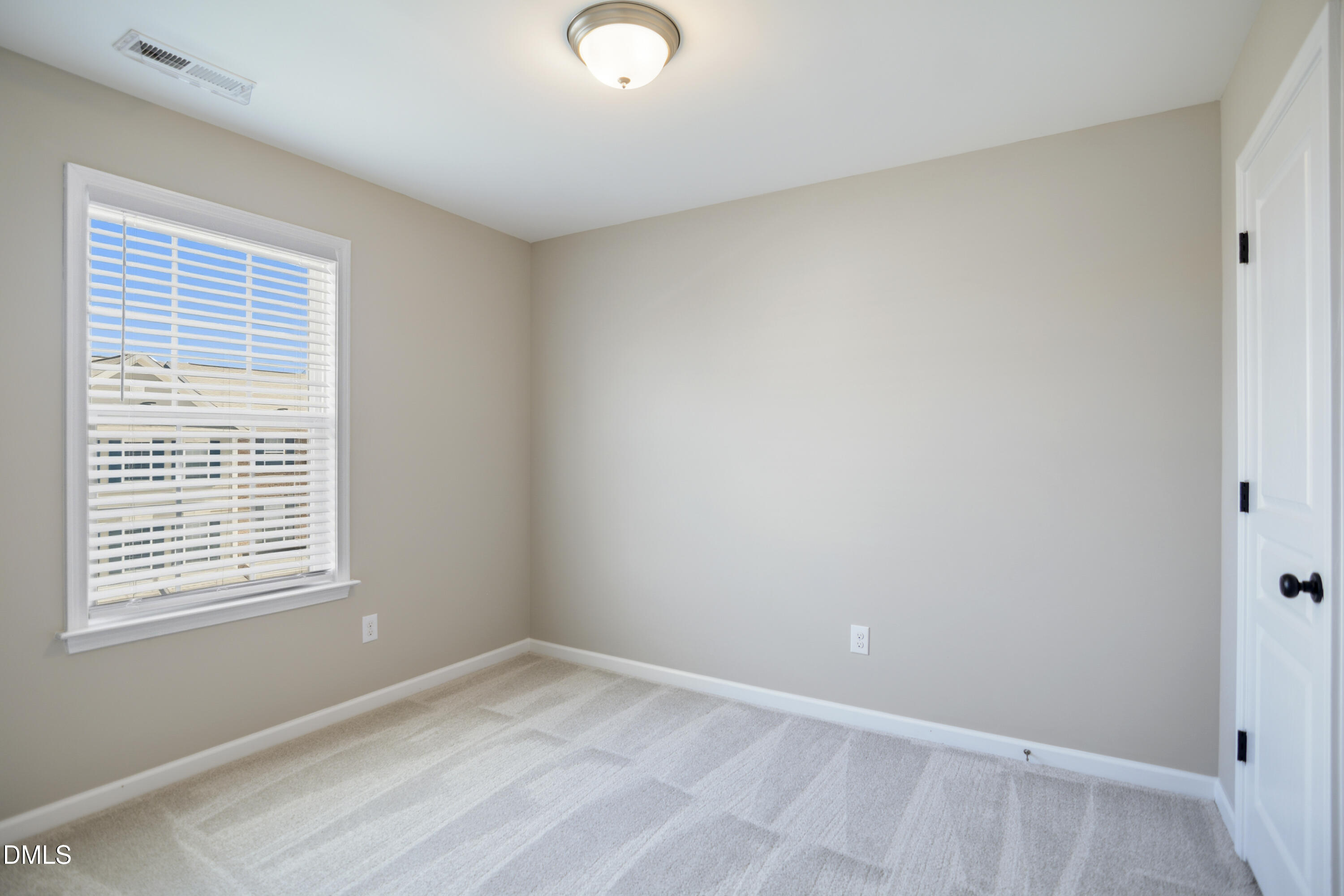 5916 Giddings Street Raleigh, NC 27616 - Photo 22 of 49 a view of an empty room with a window