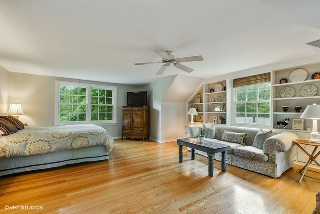 1719 Spring Creek Road Barrington Hills, IL 60010 - Photo 17 of 26 a living room with furniture and a large window