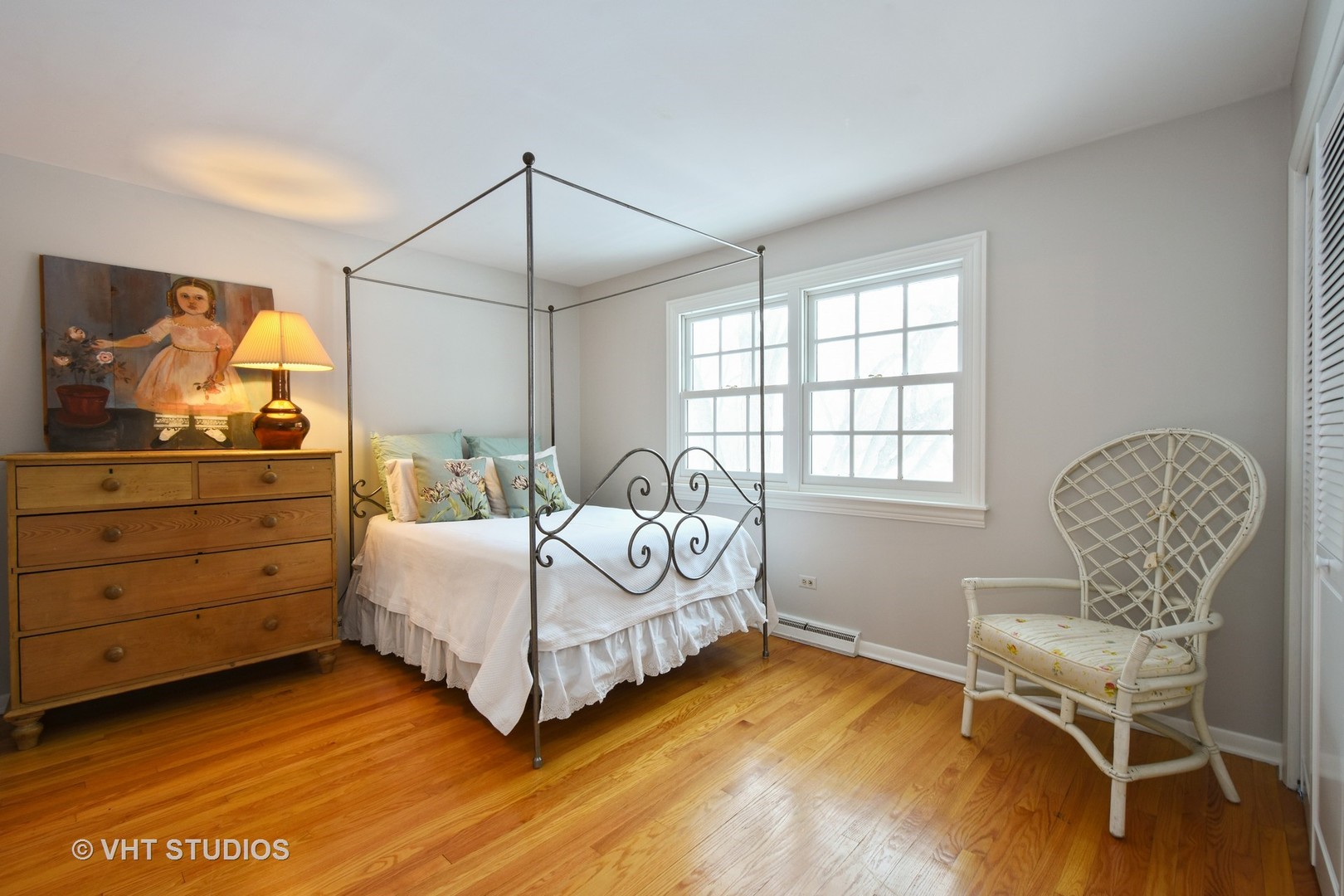 1719 Spring Creek Road Barrington Hills, IL 60010 - Photo 21 of 26 a bedroom with a bed and chair